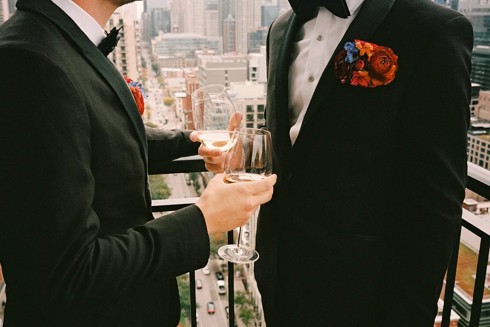 Two grooms get married downtown on Halloween night at chicago winery. Queer, gay, black tie, high-end party and drag show. Documentary and candid photos on flash film. Weddings by Grace is a Chicago lesbian queer luxury wedding photographer specializ