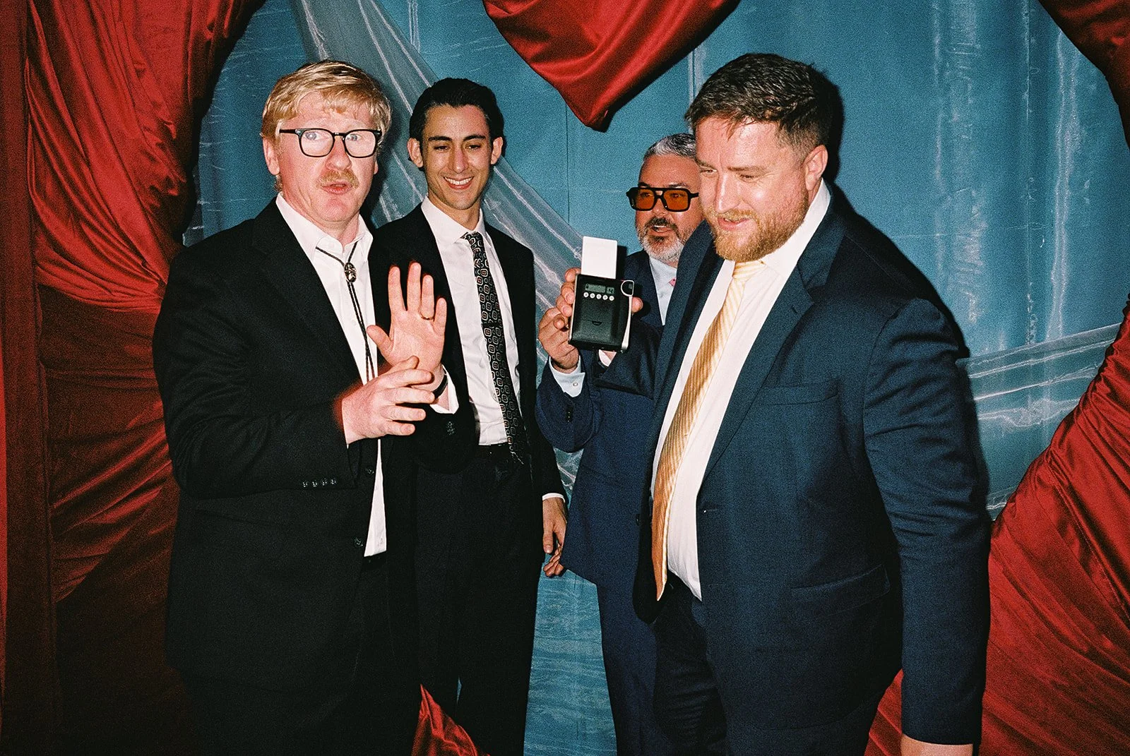 Queer couple gets married in Chicago at the empty bottle with creative, lively wedding focused on community, family, laughter. Documentary and candid photos on analog nostalgic film. Weddings by Grace is a Chicago lesbian queer luxury wedding photogr