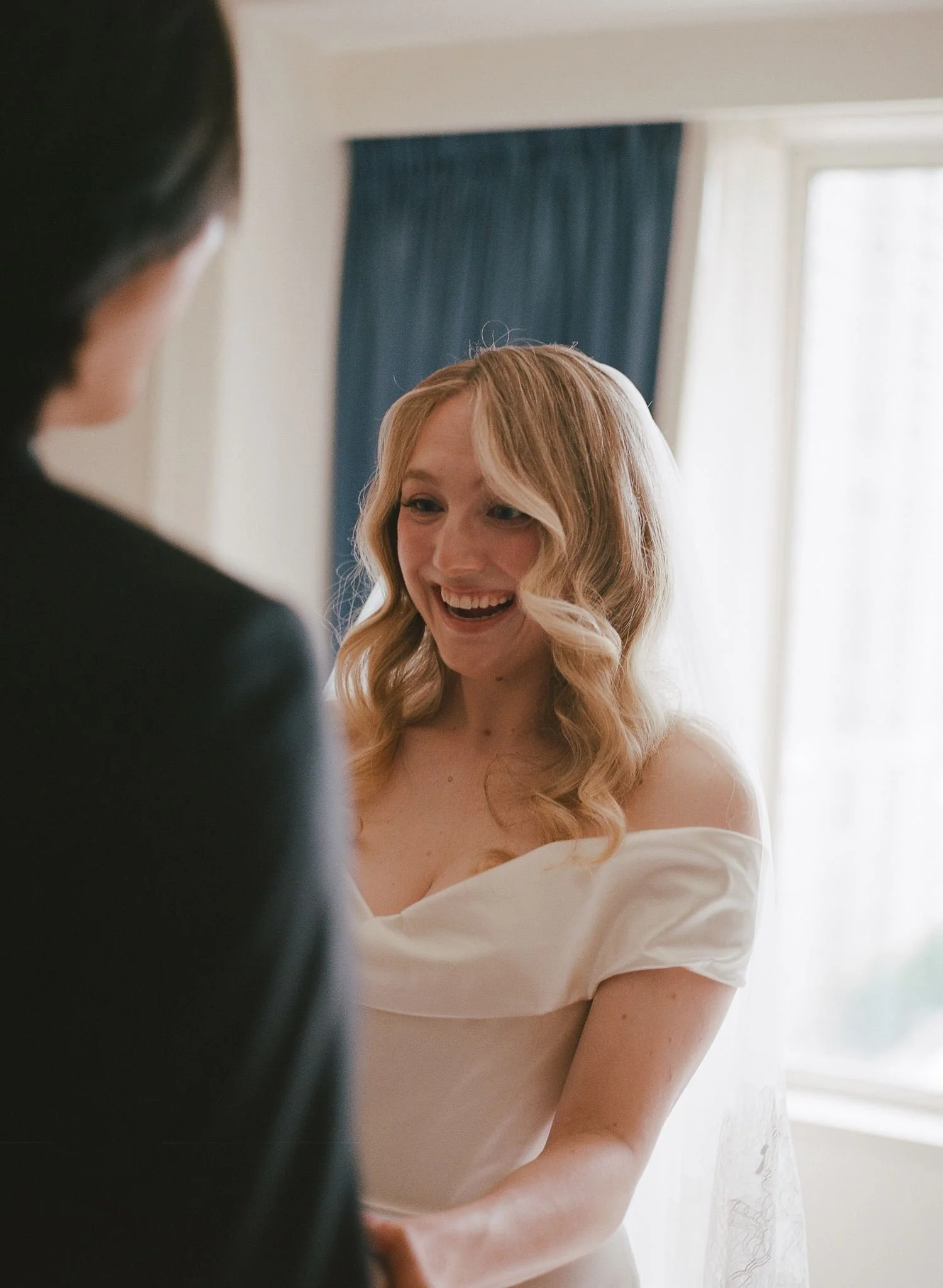 Bride and groom get married at the Chicago History Museum, with creative, lively wedding focused on community, family, laughter. Documentary and candid photos on analog nostalgic film. Weddings by Grace is a Chicago lesbian queer luxury wedding photo