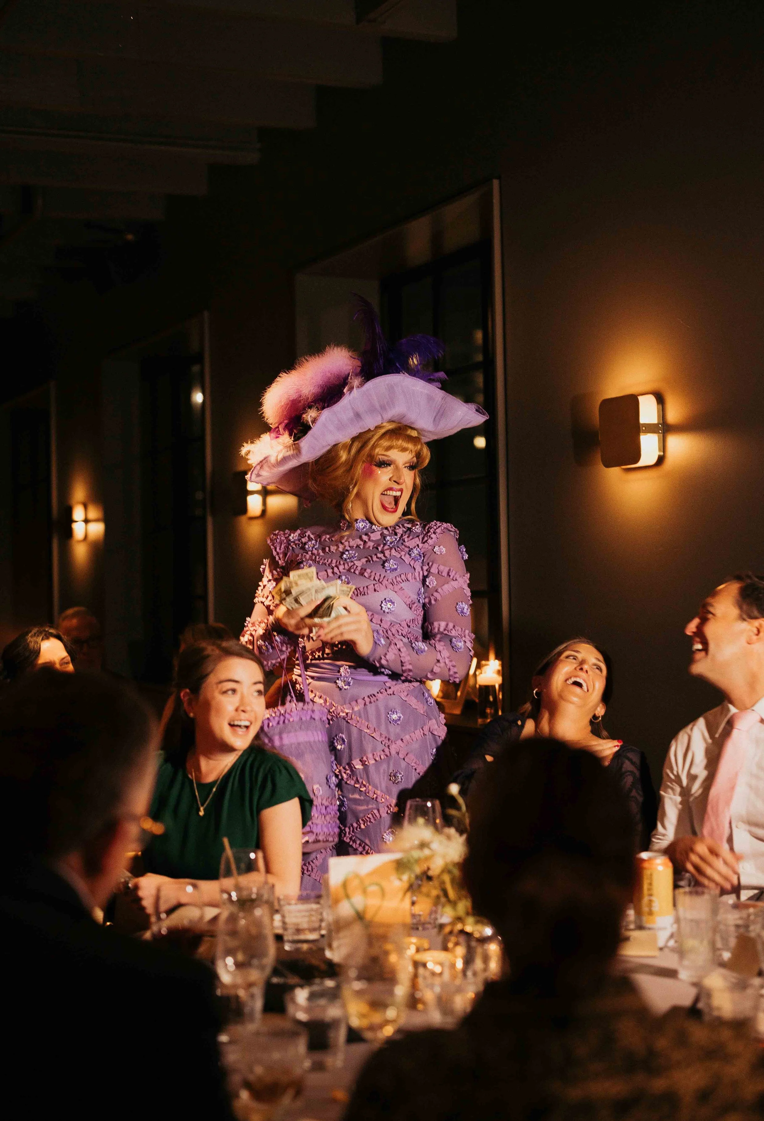 Groom and groom get married at maxwells trading with creative, lively wedding focused on community, queer family, laughter. Documentary and candid photos on analog nostalgic film. Weddings by Grace is a Chicago lesbian queer luxury wedding photograph