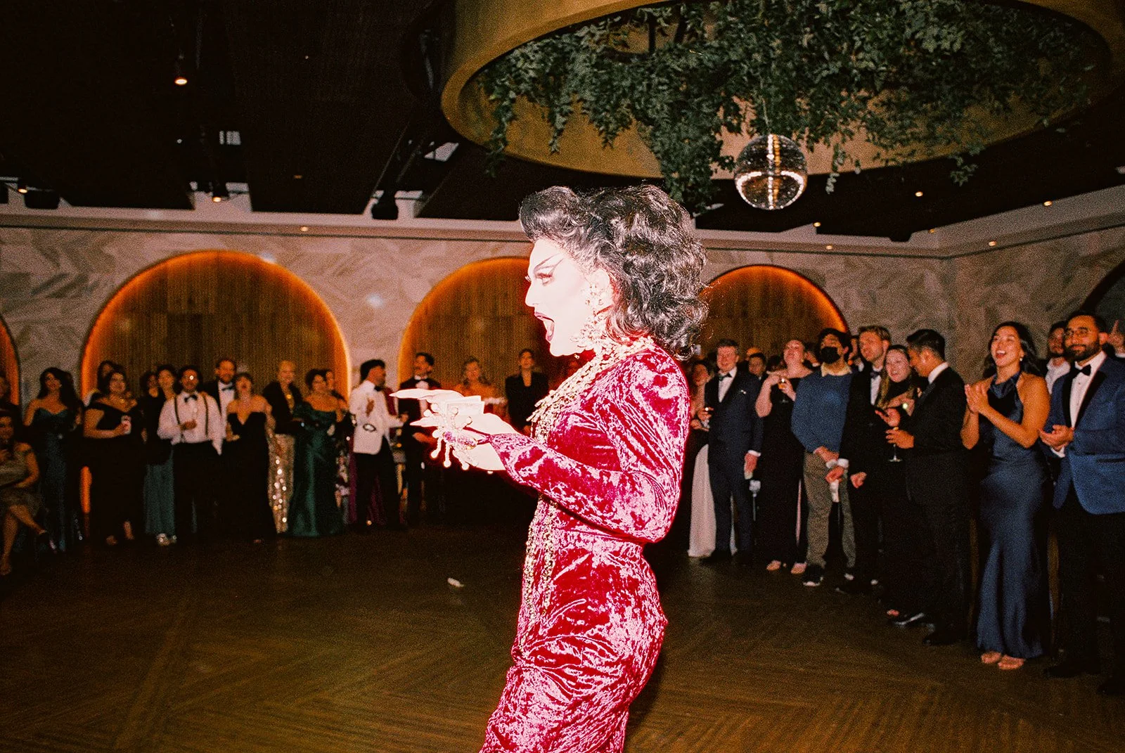 Two grooms get married downtown on Halloween night at chicago winery. Queer, gay, black tie, high-end party and drag show. Documentary and candid photos on flash film. Weddings by Grace is a Chicago lesbian queer luxury wedding photographer specializ