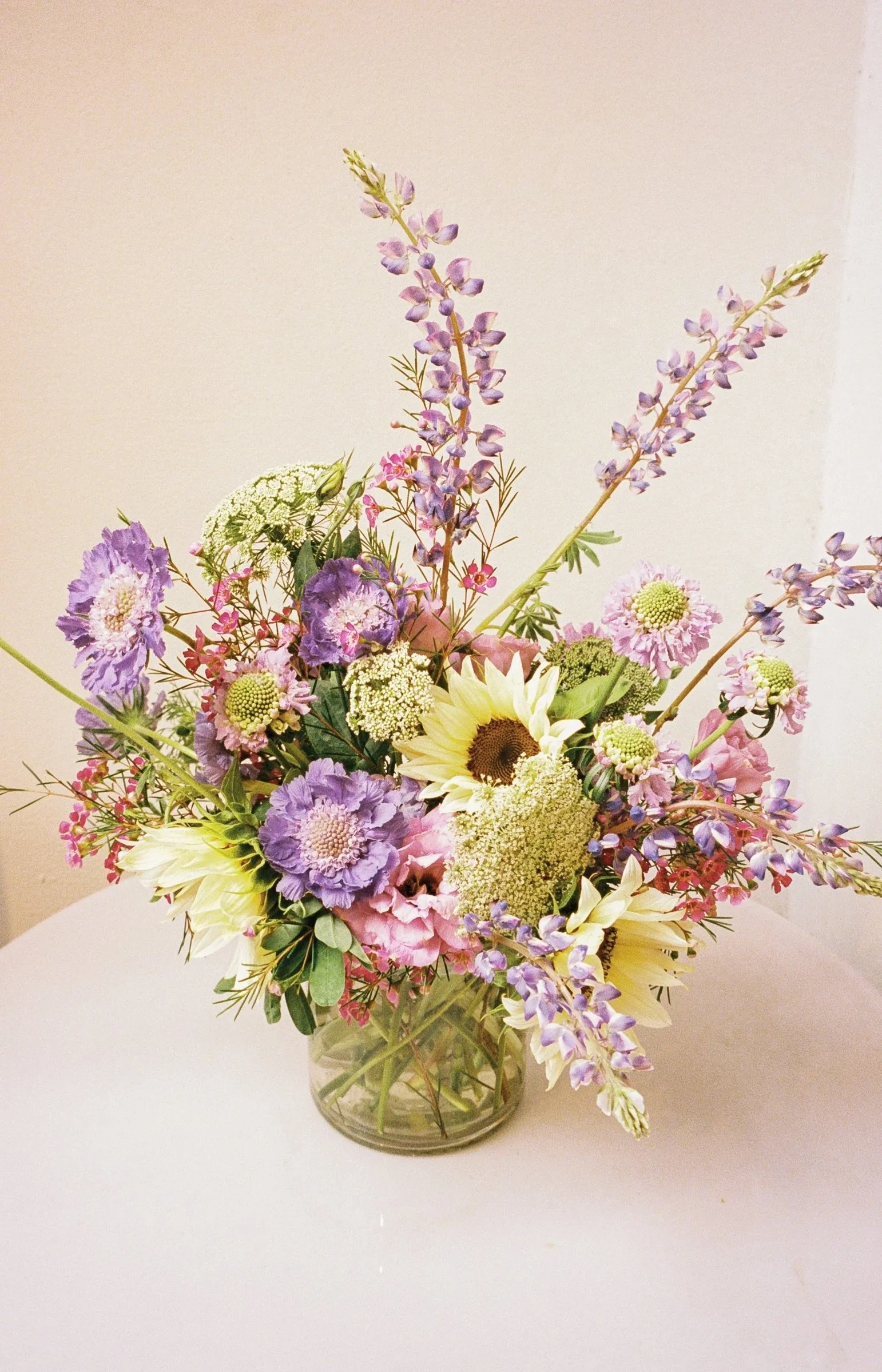 Weddings by grace is a Chicago lesbian queer luxury photographer specializing in portraits, candid, editorial, documentary, + artistic images with analog film photography.