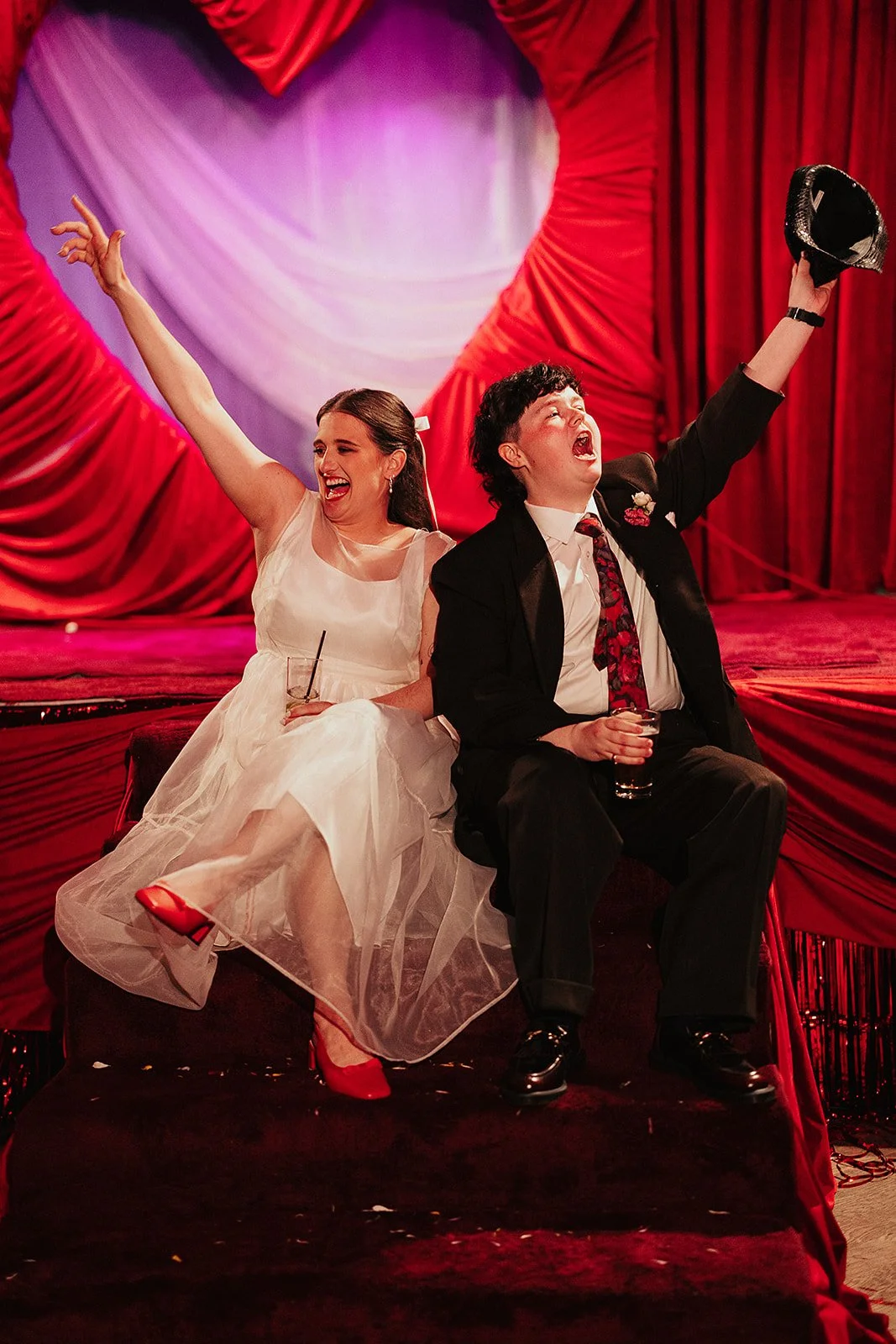 Queer couple gets married in Chicago at the empty bottle with creative, lively wedding focused on community, family, laughter. Documentary and candid photos on analog nostalgic film. Weddings by Grace is a Chicago lesbian queer luxury wedding photogr