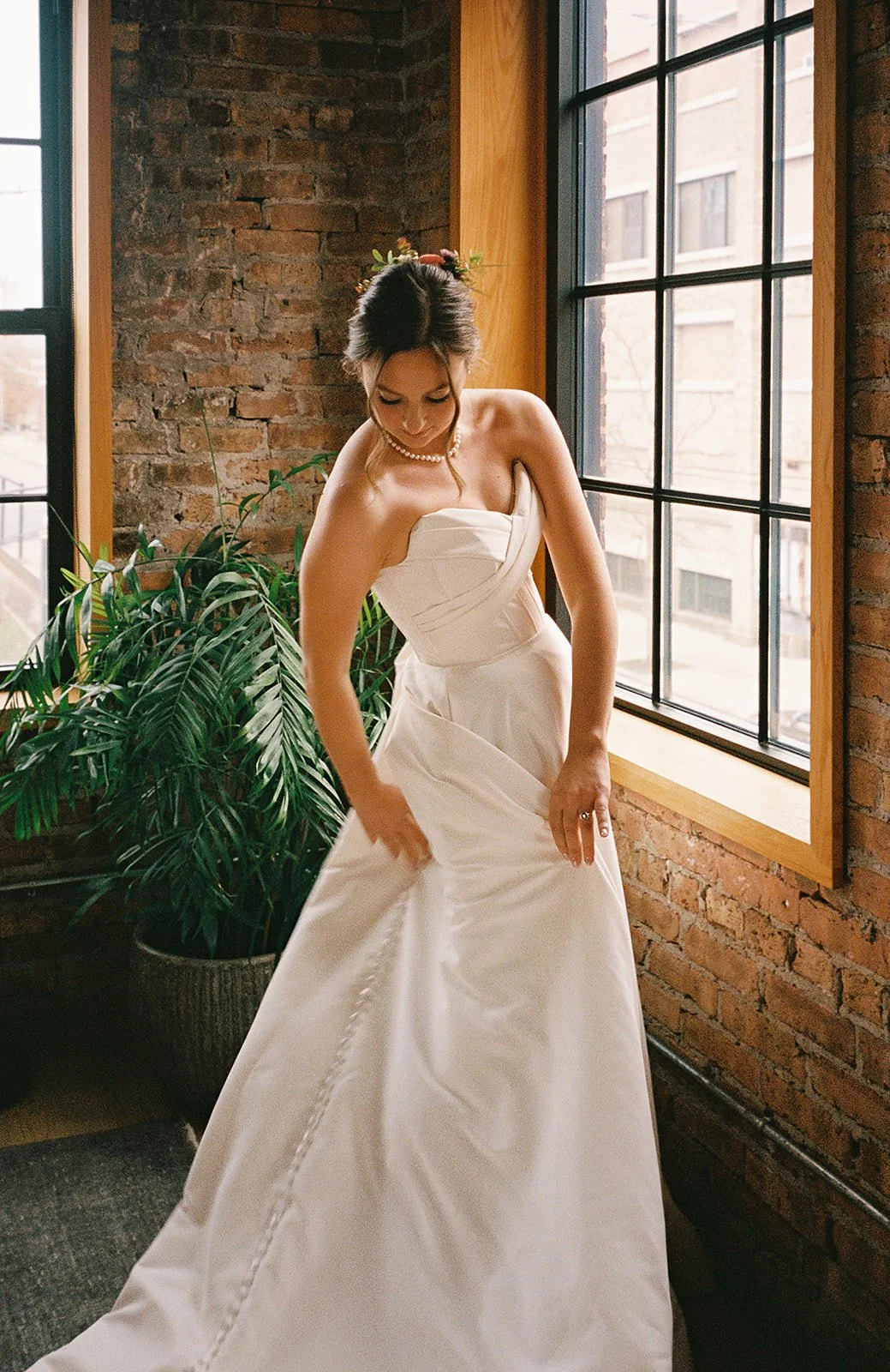 Bride and groom get married in Chicago at WildmanBT, with creative, lively wedding focused on community, family, laughter. Documentary and candid photos on flash film. Weddings by Grace is a Chicago lesbian queer luxury wedding photographer specializ