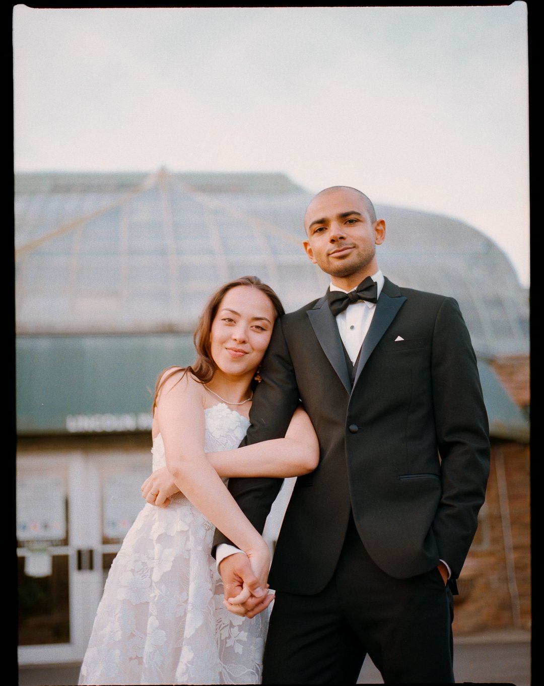 portraits of Bride and Groom get married at Lincoln Park Conservatory and Salvatores. Grace Coudal is a Chicago lesbian photographer specializing in portraits, candid, editorial, documentary, events, + weddings. Analog film wedding photography, queer