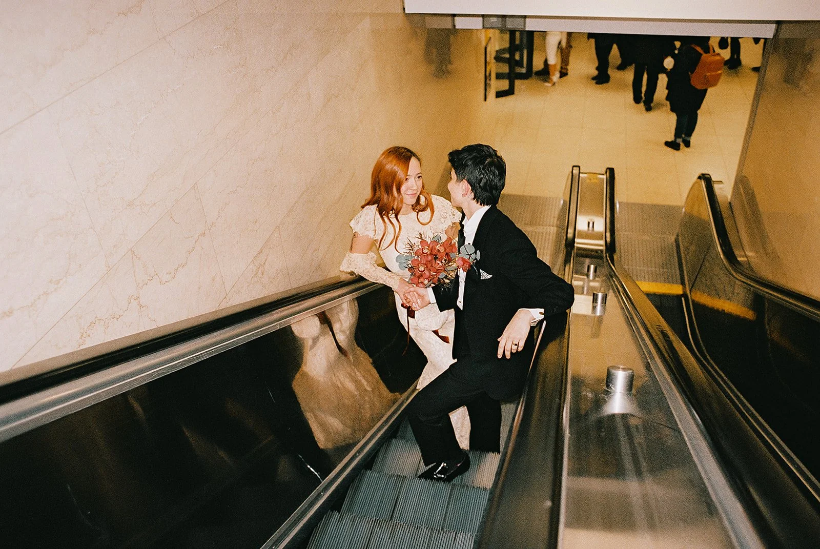 Queer elopement downtown at Chicago’s city hall. Documentary and candid photos on flash film. Weddings by Grace is a Chicago lesbian queer luxury wedding photographer specializing in portraits, candid, editorial, documentary, + artistic images with a