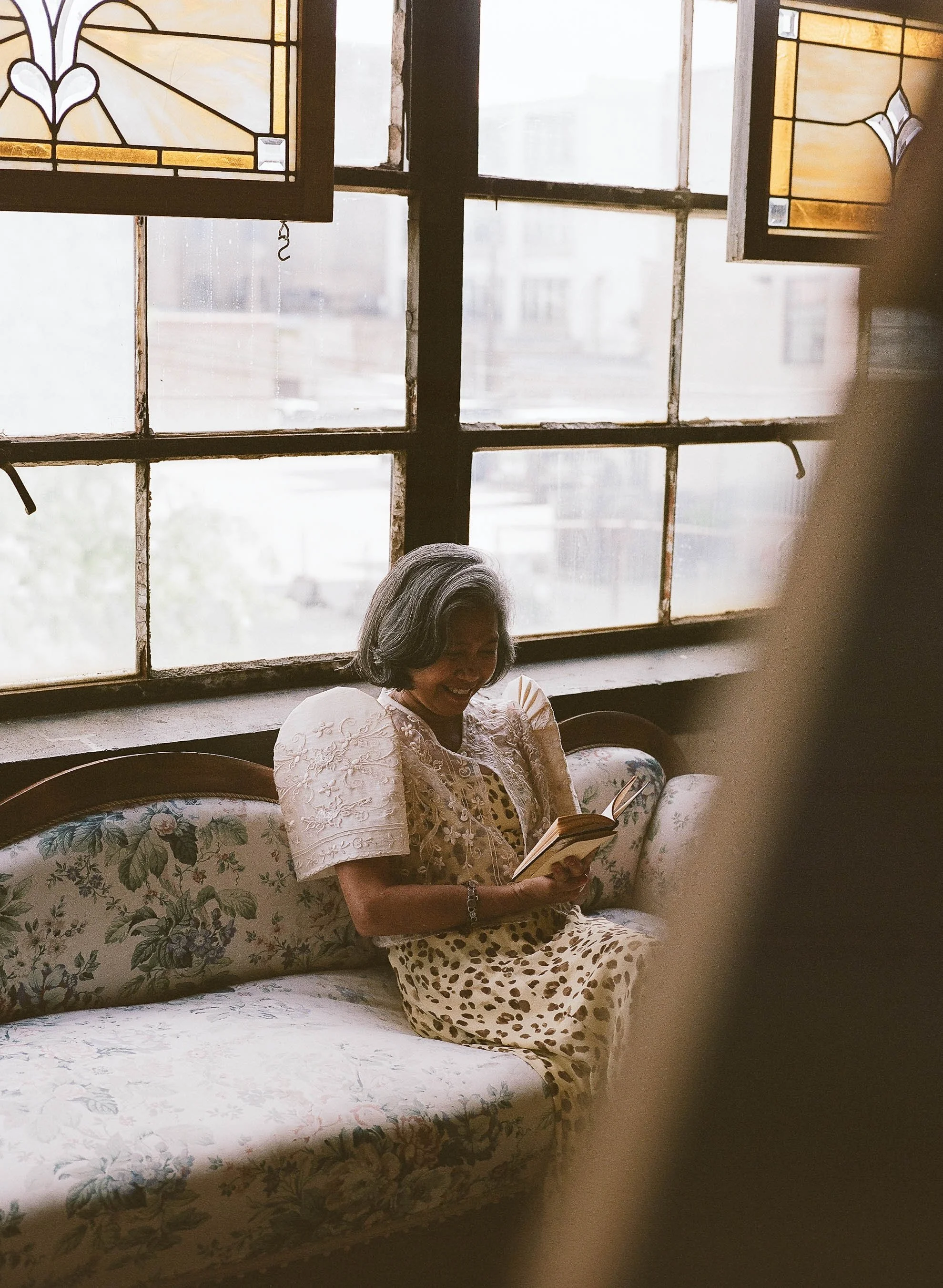 Bride and groom get married in Chicago at Salvage One, with creative, lively wedding focused on community, family, laughter. Documentary and candid photos on analog nostalgic film. Weddings by Grace is a Chicago lesbian queer luxury wedding photograp