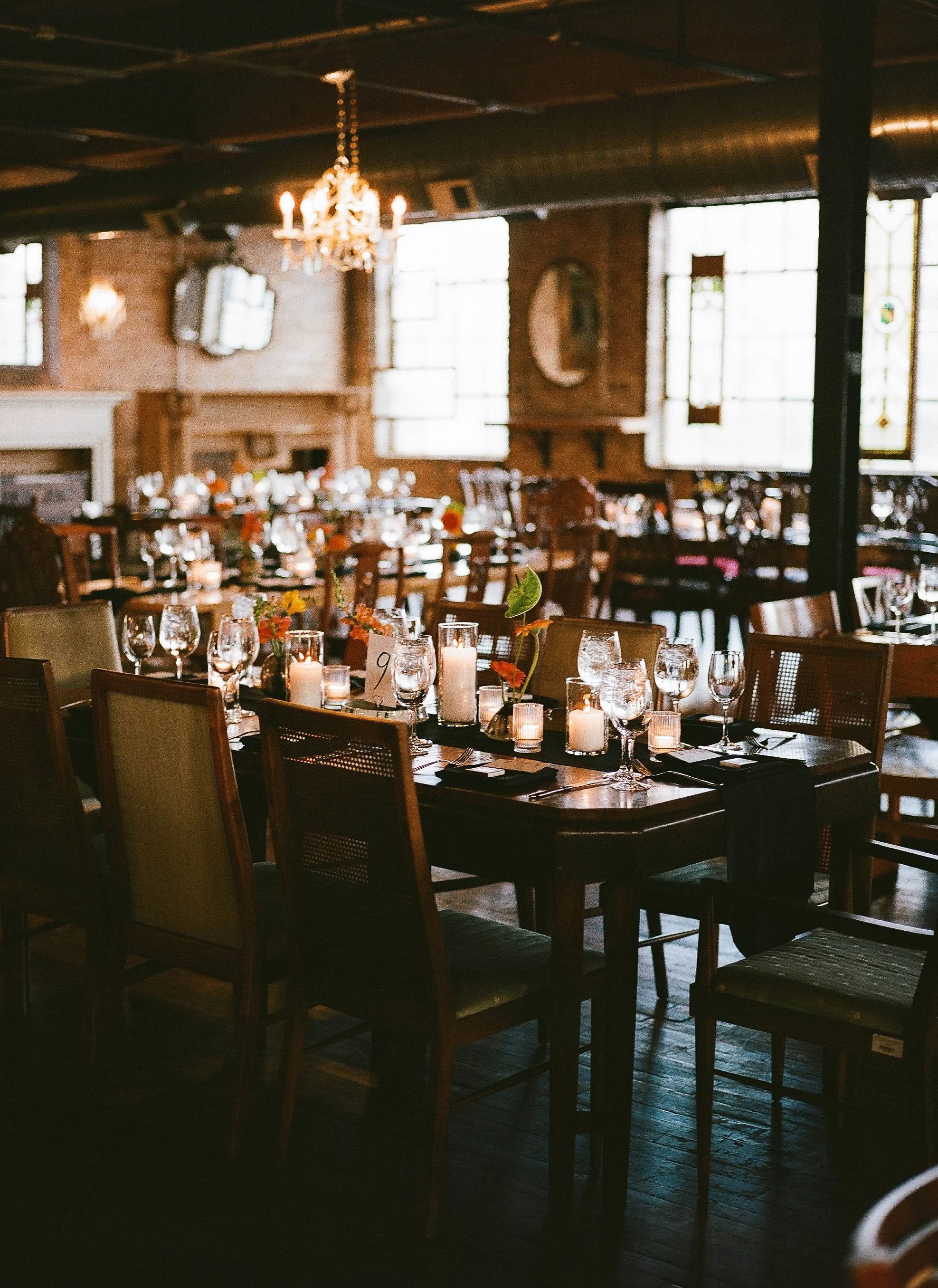 Bride and groom get married in Chicago at Salvage One, with creative, lively wedding focused on community, family, laughter. Documentary and candid photos on analog nostalgic film. Weddings by Grace is a Chicago lesbian queer luxury wedding photograp