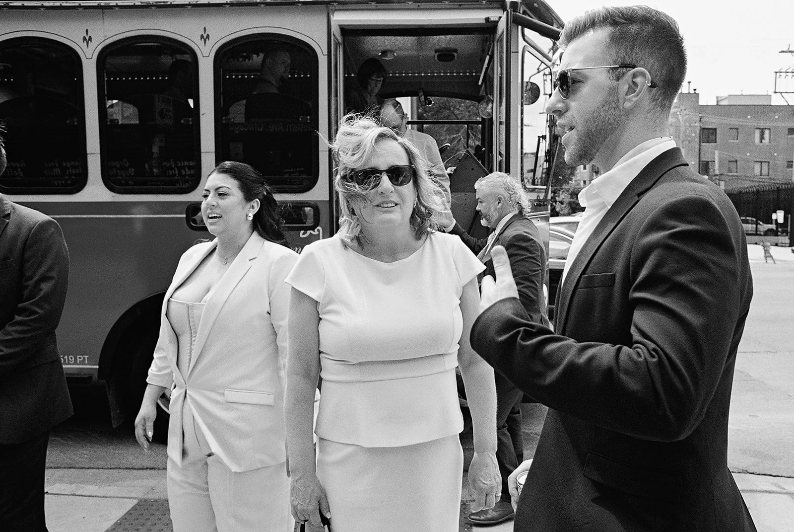 Queer couple gets married in Chicago at the empty bottle with creative, lively wedding focused on community, family, laughter. Documentary and candid photos on analog nostalgic film. Weddings by Grace is a Chicago lesbian queer luxury wedding photogr