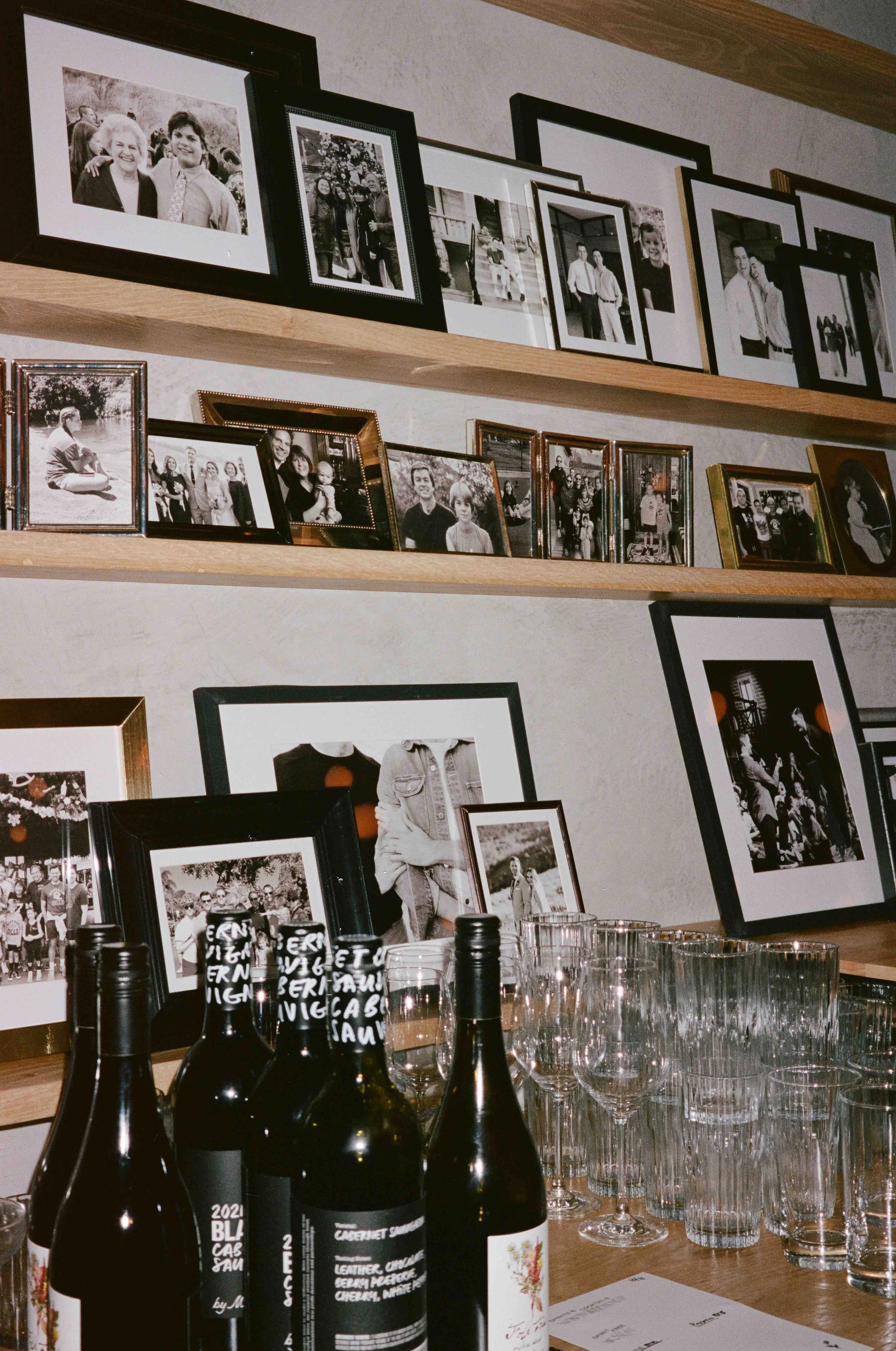 Groom and groom get married at maxwells trading with creative, lively wedding focused on community, queer family, laughter. Documentary and candid photos on analog nostalgic film. Weddings by Grace is a Chicago lesbian queer luxury wedding photograph