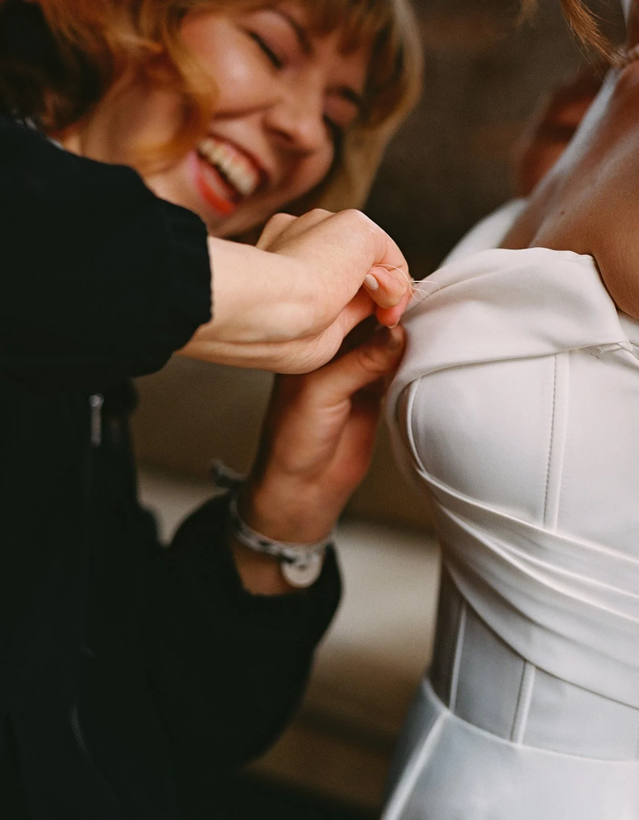 Bride and groom get married in Chicago at WildmanBT, with creative, lively wedding focused on community, family, laughter. Documentary and candid photos on flash film. Weddings by Grace is a Chicago lesbian queer luxury wedding photographer specializ