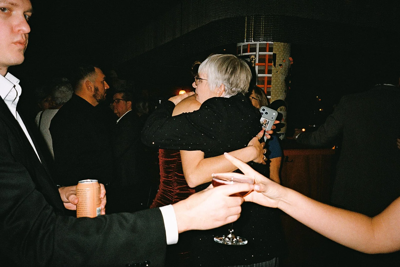 Fun flash photos of lesbian wedding at Dorothy bar. Documentary and candid photos on flash film. Weddings by Grace is a Chicago lesbian queer luxury wedding photographer specializing in portraits, candid, editorial, documentary, + artistic images wit