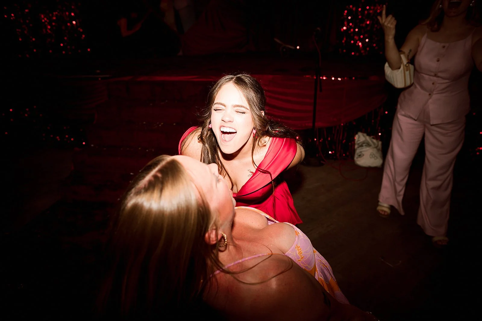 Queer couple gets married in Chicago at the empty bottle with creative, lively wedding focused on community, family, laughter. Documentary and candid photos on analog nostalgic film. Weddings by Grace is a Chicago lesbian queer luxury wedding photogr