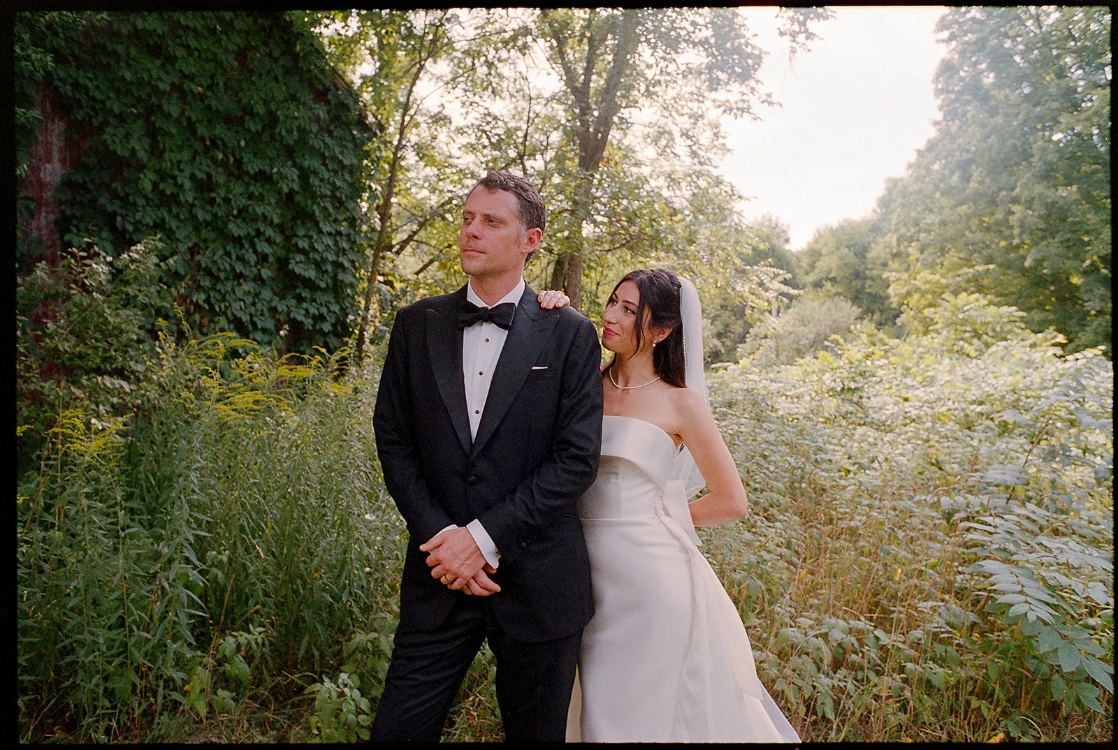 Bride and groom get married at the Millcreek Wilde in St. Joseph, Michigan. Grace Coudal is a Chicago lesbian photographer specializing in portraits, candid, editorial, documentary, events, + weddings. Analog film wedding photography, queer-owned.