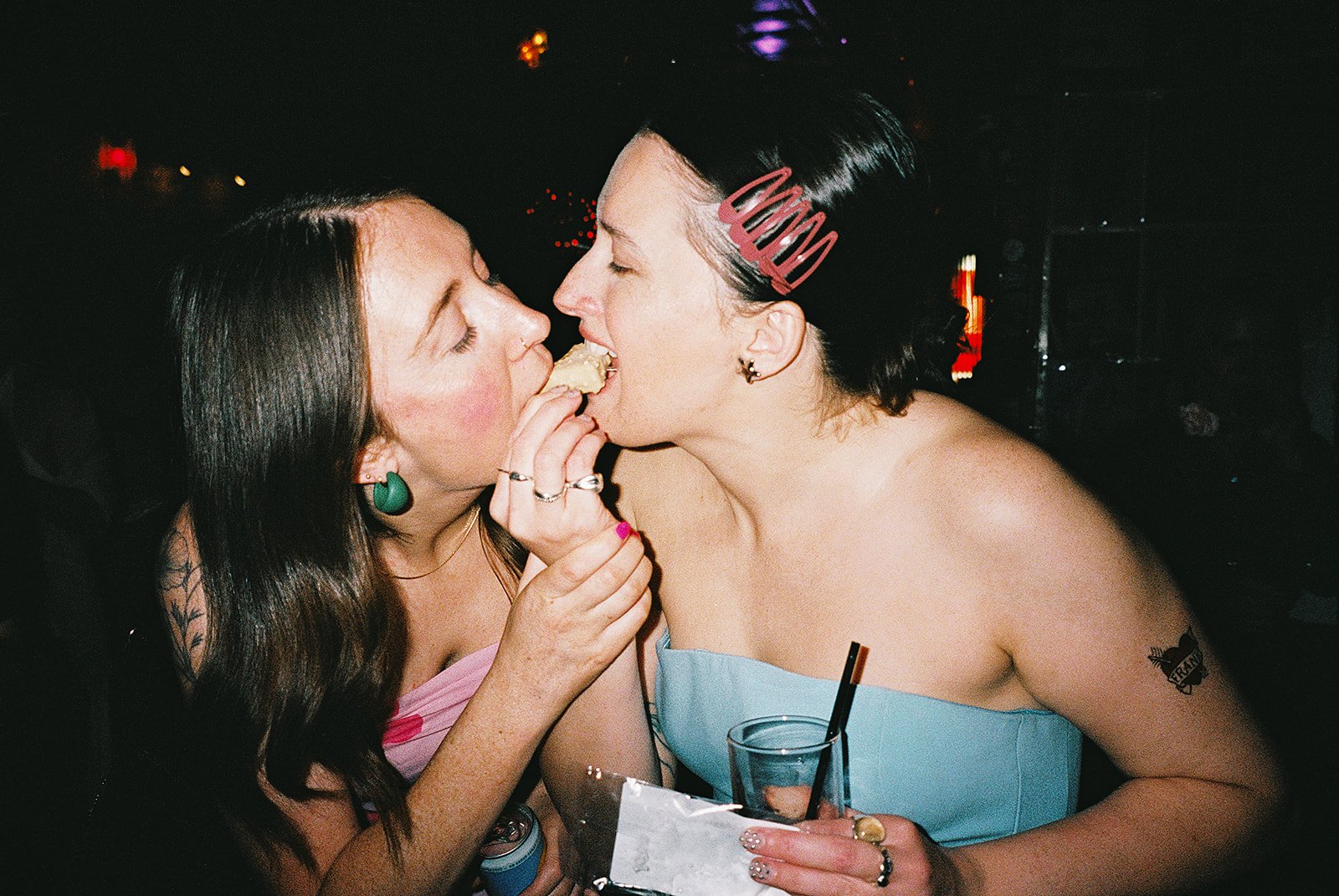 Queer couple gets married in Chicago at the empty bottle with creative, lively wedding focused on community, family, laughter. Documentary and candid photos on analog nostalgic film. Weddings by Grace is a Chicago lesbian queer luxury wedding photogr