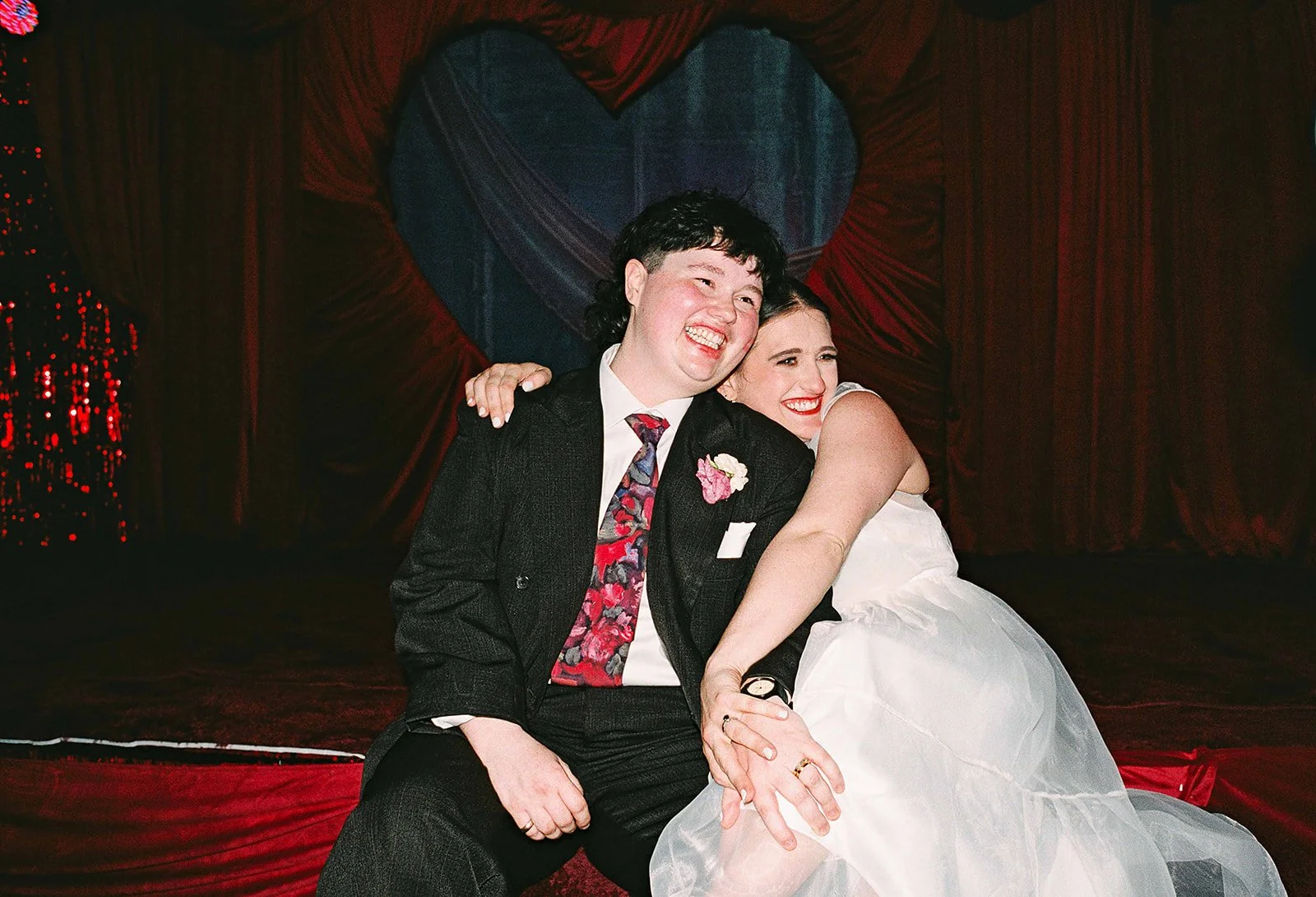 Queer couple gets married in Chicago at the empty bottle with creative, lively wedding focused on community, family, laughter. Documentary and candid photos on analog nostalgic film. Weddings by Grace is a Chicago lesbian queer luxury wedding photogr