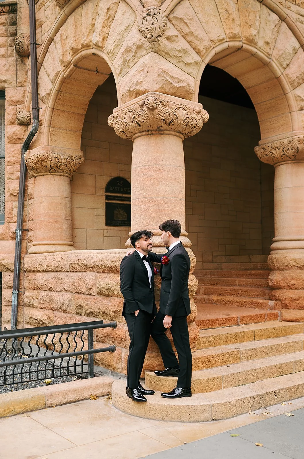 Two grooms get married downtown on Halloween night at chicago winery. Queer, gay, black tie, high-end party and drag show. Documentary and candid photos on flash film. Weddings by Grace is a Chicago lesbian queer luxury wedding photographer specializ