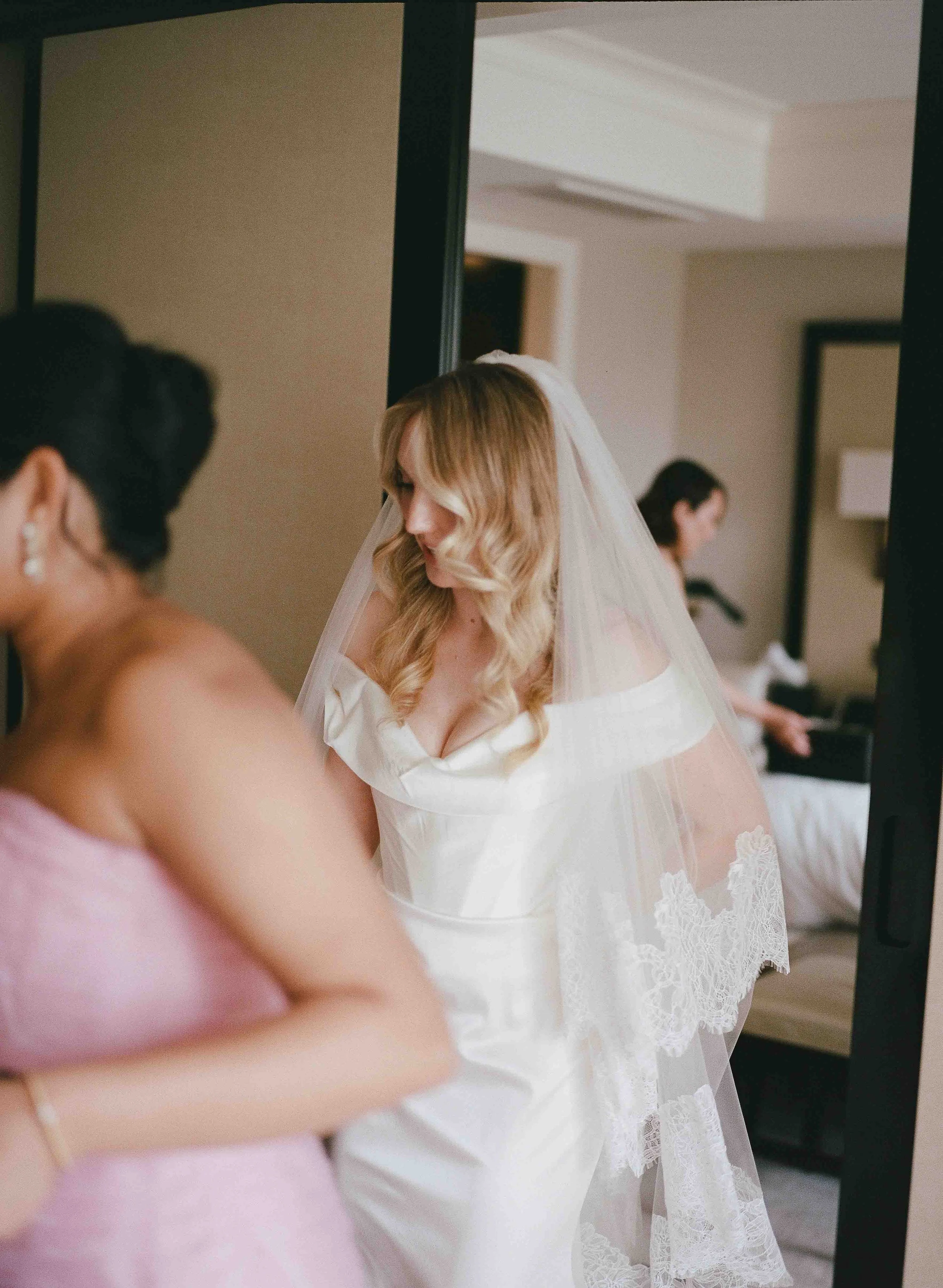 Bride and groom get married at the Chicago History Museum, with creative, lively wedding focused on community, family, laughter. Documentary and candid photos on analog nostalgic film. Weddings by Grace is a Chicago lesbian queer luxury wedding photo