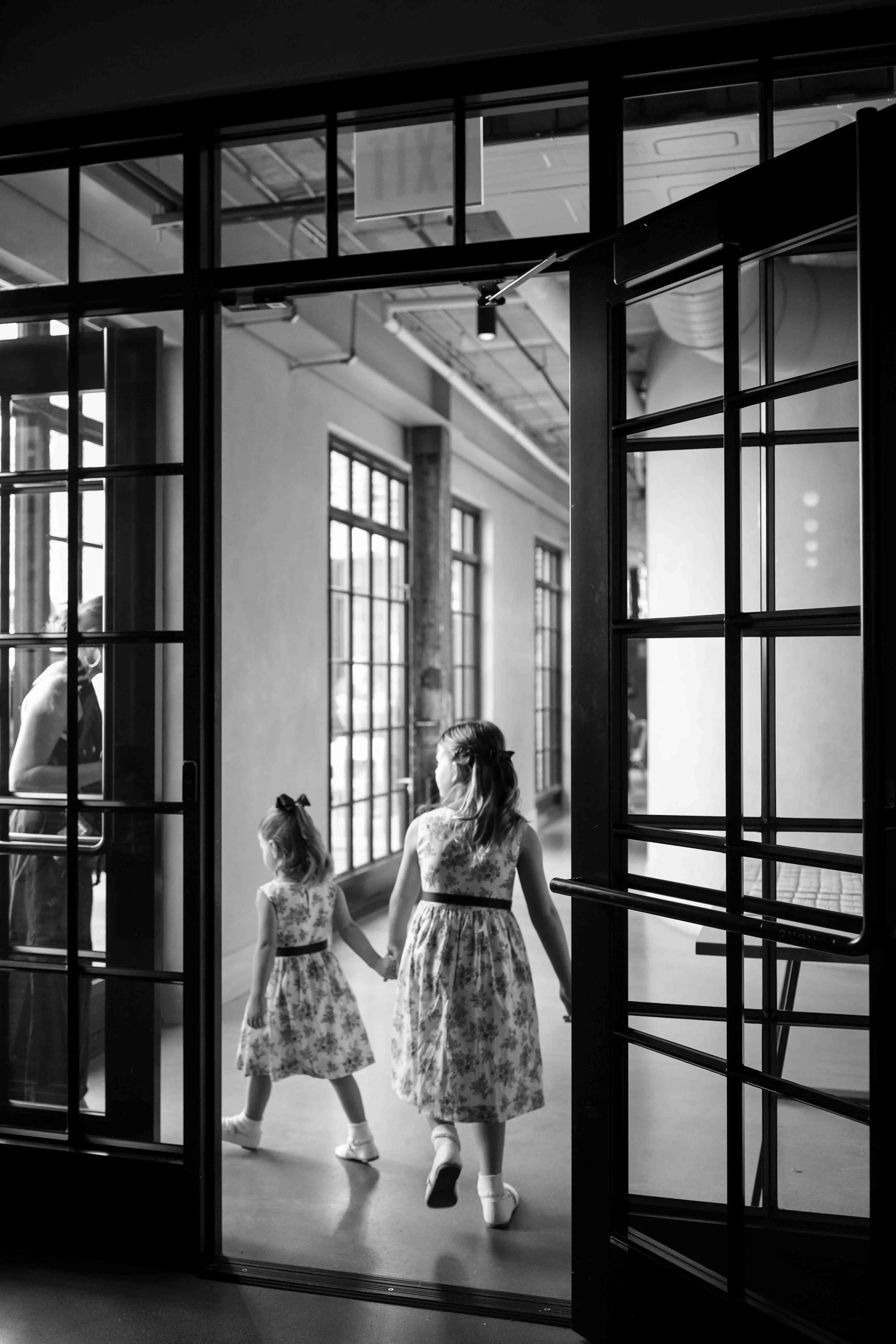 Groom and groom get married at maxwells trading with creative, lively wedding focused on community, queer family, laughter. Documentary and candid photos on analog nostalgic film. Weddings by Grace is a Chicago lesbian queer luxury wedding photograph