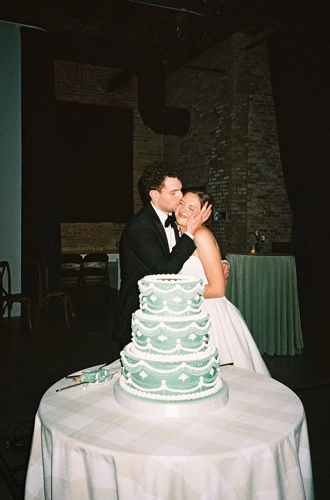 Bride and groom get married in Chicago at WildmanBT, with creative, lively wedding focused on community, family, laughter. Documentary and candid photos on flash film. Weddings by Grace is a Chicago lesbian queer luxury wedding photographer specializ