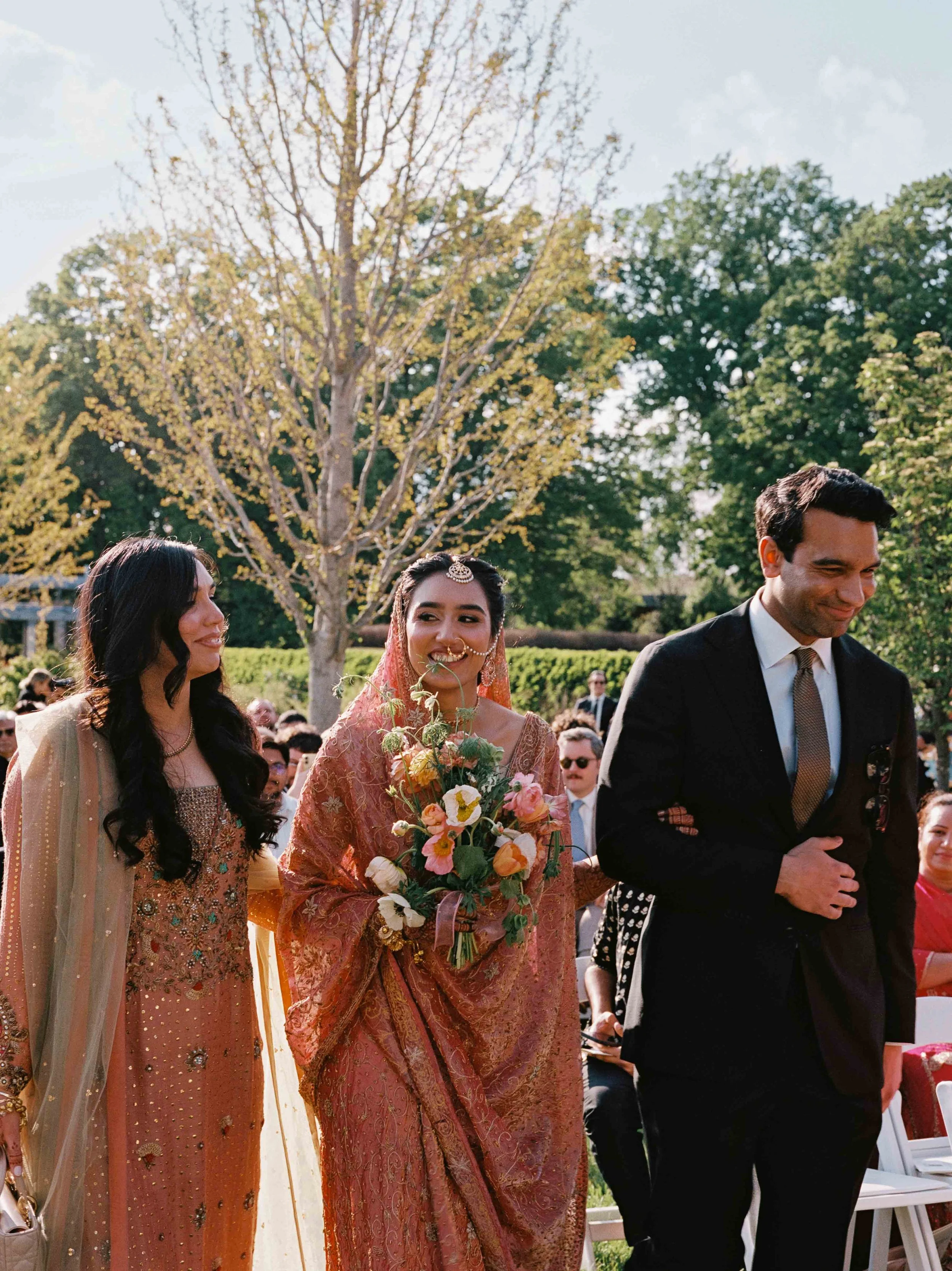 Weddings by grace is a Chicago lesbian queer luxury photographer specializing in portraits, candid, editorial, documentary, + artistic images with analog film photography.