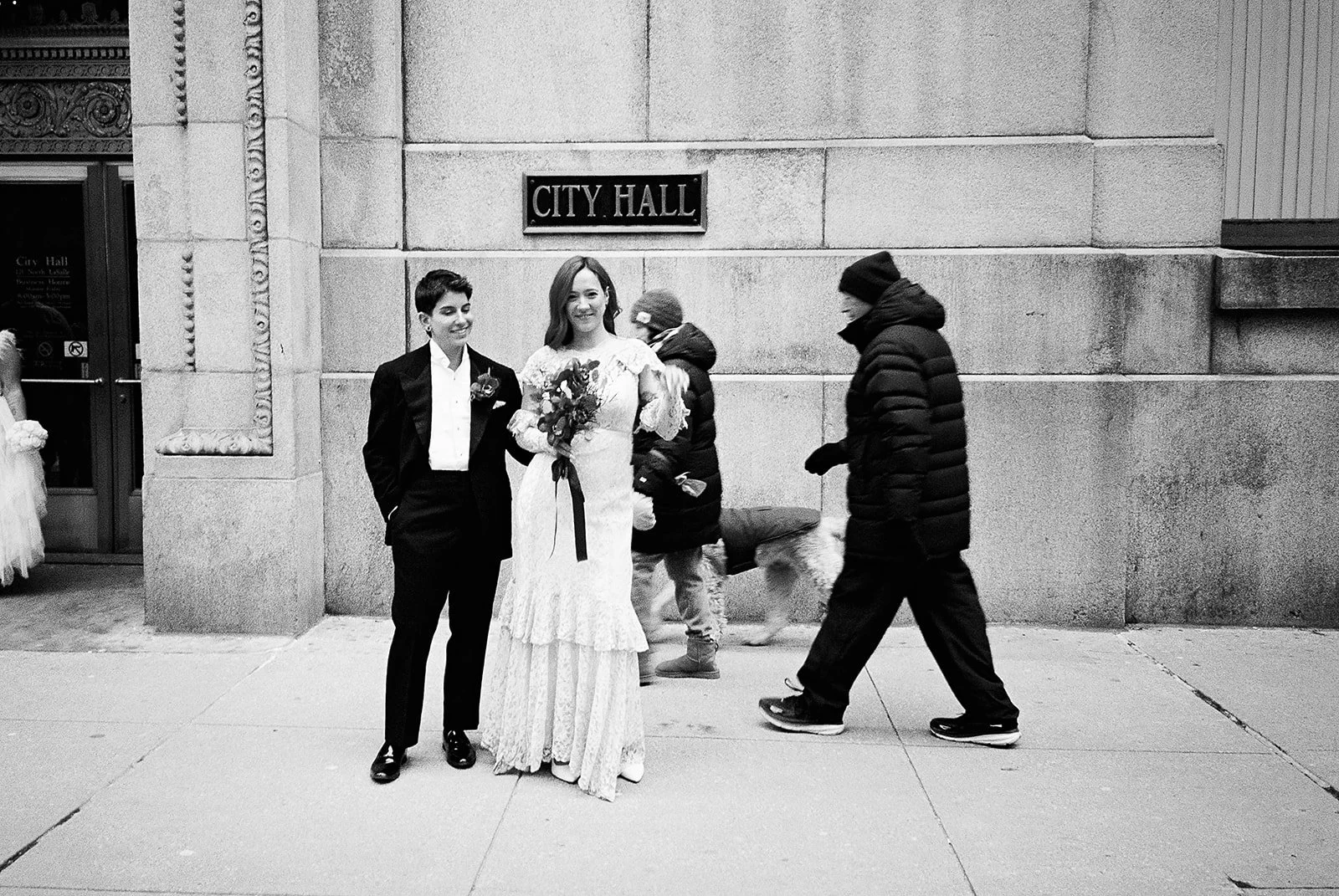 Queer elopement downtown at Chicago’s city hall. Documentary and candid photos on flash film. Weddings by Grace is a Chicago lesbian queer luxury wedding photographer specializing in portraits, candid, editorial, documentary, + artistic images with a