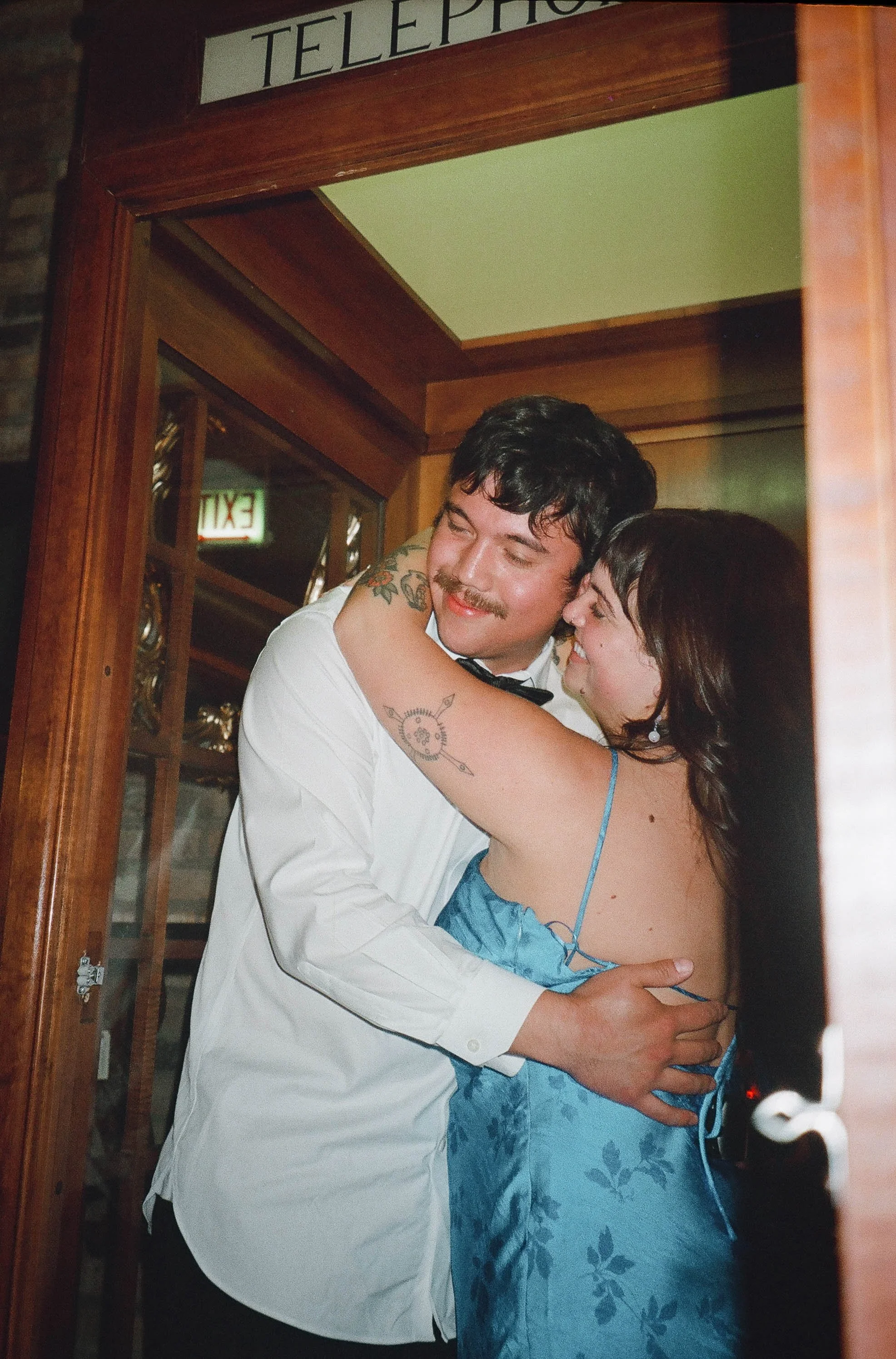 Weddings by grace is a Chicago lesbian queer luxury photographer specializing in portraits, candid, editorial, documentary, + artistic images with analog film photography.