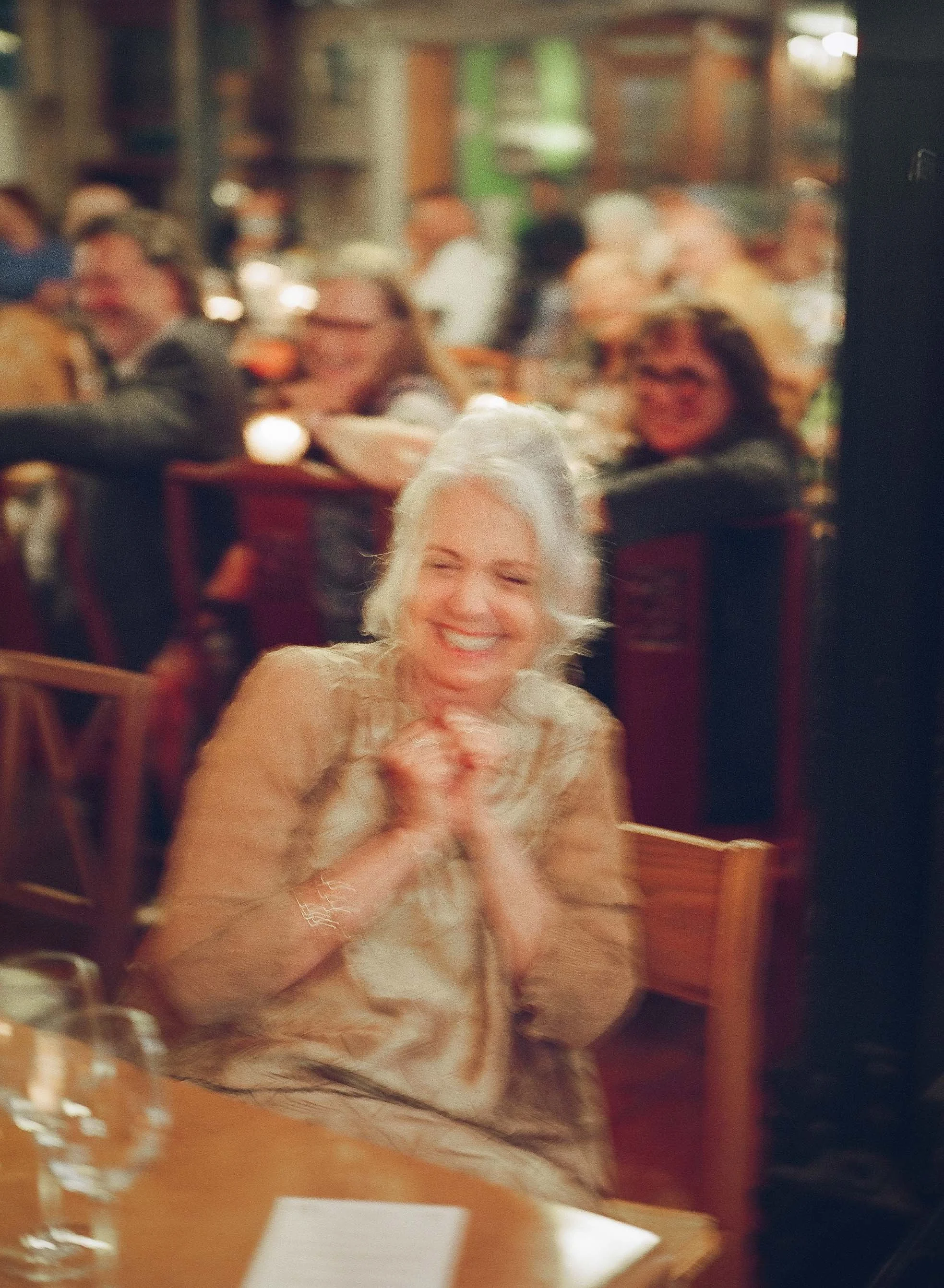 Bride and groom get married in Chicago at Salvage One, with creative, lively wedding focused on community, family, laughter. Documentary and candid photos on analog nostalgic film. Weddings by Grace is a Chicago lesbian queer luxury wedding photograp