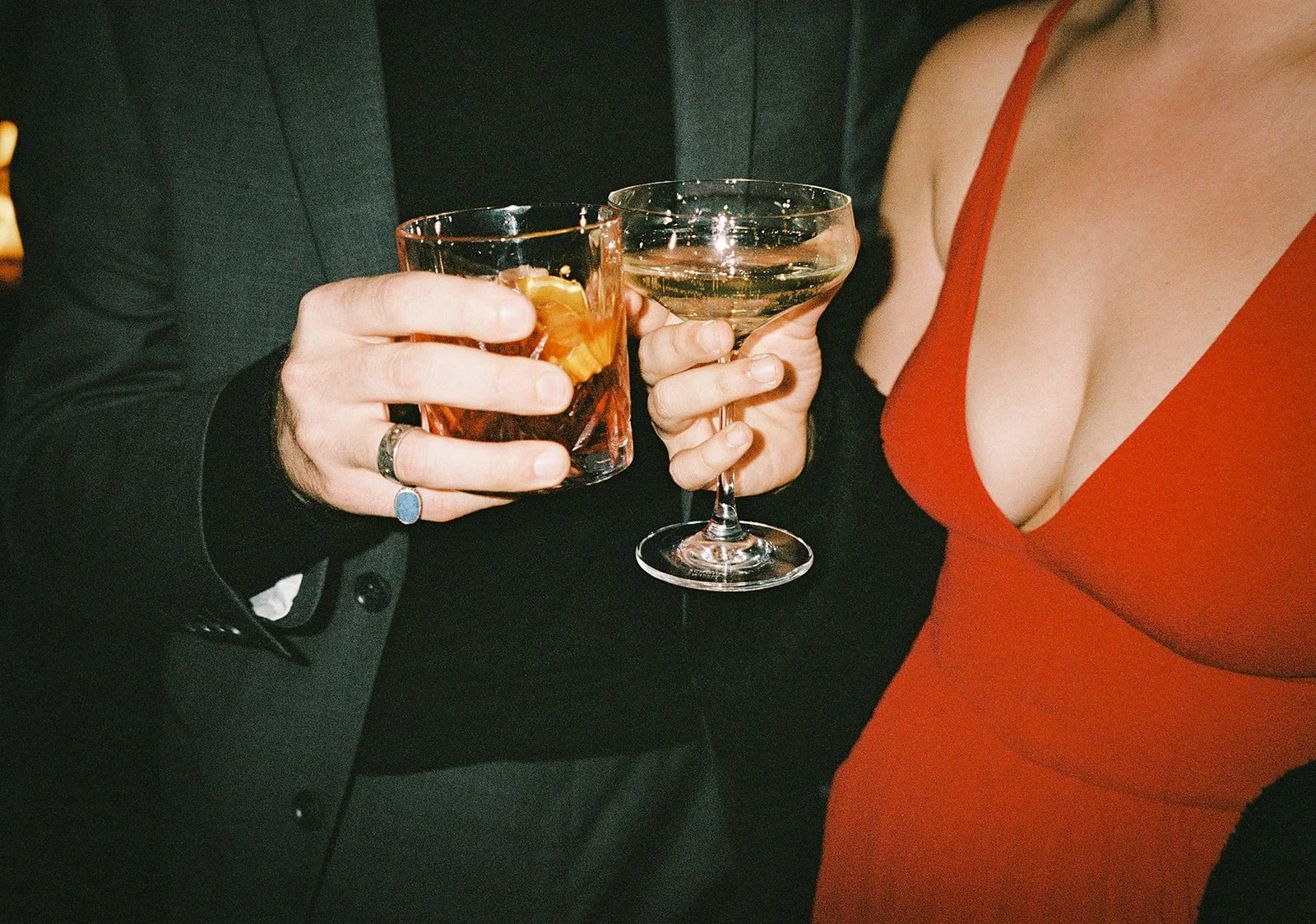 Two grooms get married downtown on Halloween night at chicago winery. Queer, gay, black tie, high-end party and drag show. Documentary and candid photos on flash film. Weddings by Grace is a Chicago lesbian queer luxury wedding photographer specializ