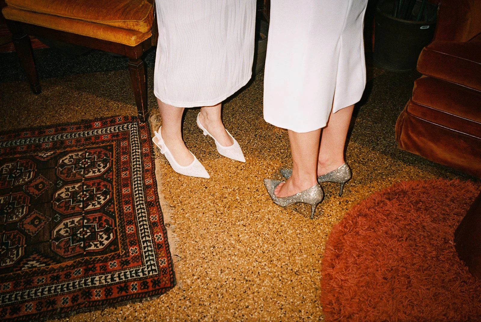 Fun flash photos of lesbian wedding at Dorothy bar. Documentary and candid photos on flash film. Weddings by Grace is a Chicago lesbian queer luxury wedding photographer specializing in portraits, candid, editorial, documentary, + artistic images wit