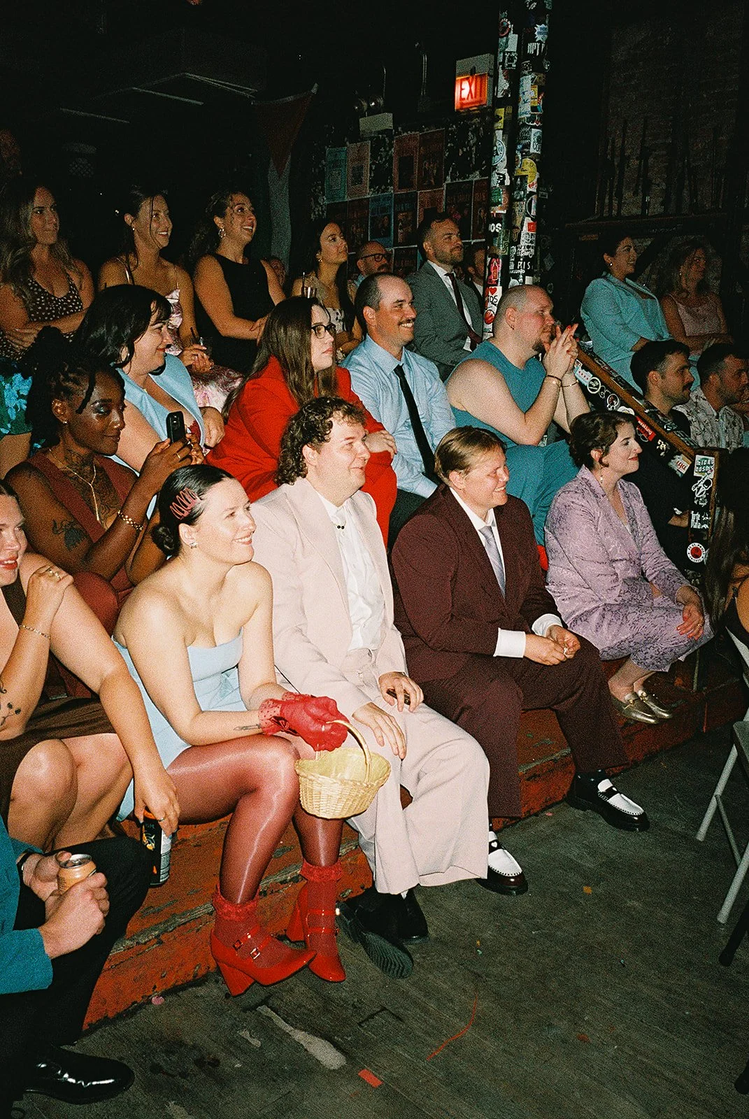 Queer couple gets married in Chicago at the empty bottle with creative, lively wedding focused on community, family, laughter. Documentary and candid photos on analog nostalgic film. Weddings by Grace is a Chicago lesbian queer luxury wedding photogr