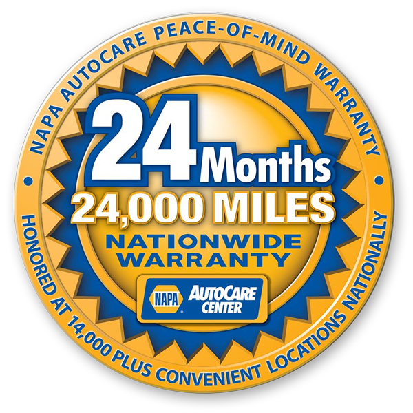 A circular badge with a gold border and blue accents showing a 24-month nationwide warranty for NAPA AutoCare. It states 24,000 miles coverage, honored at over 14,000 locations, and highlights the 24-month auto care peace-of-mind warranty.