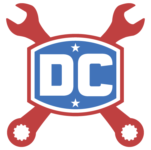 Logo featuring the letters 'DC' in white on a blue shield with red fencing and two crossed red wrenches background.