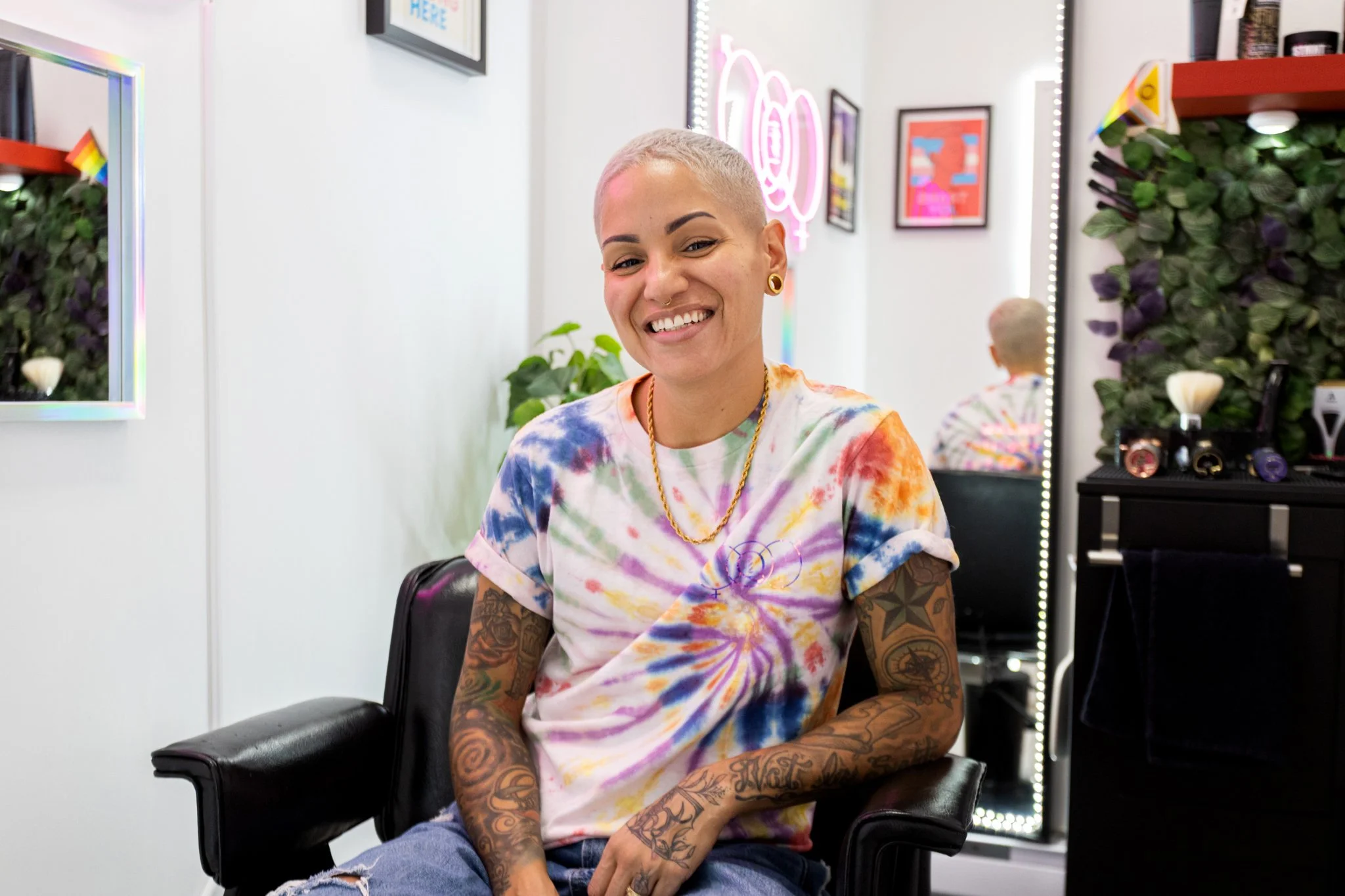 E sitting in barber chair