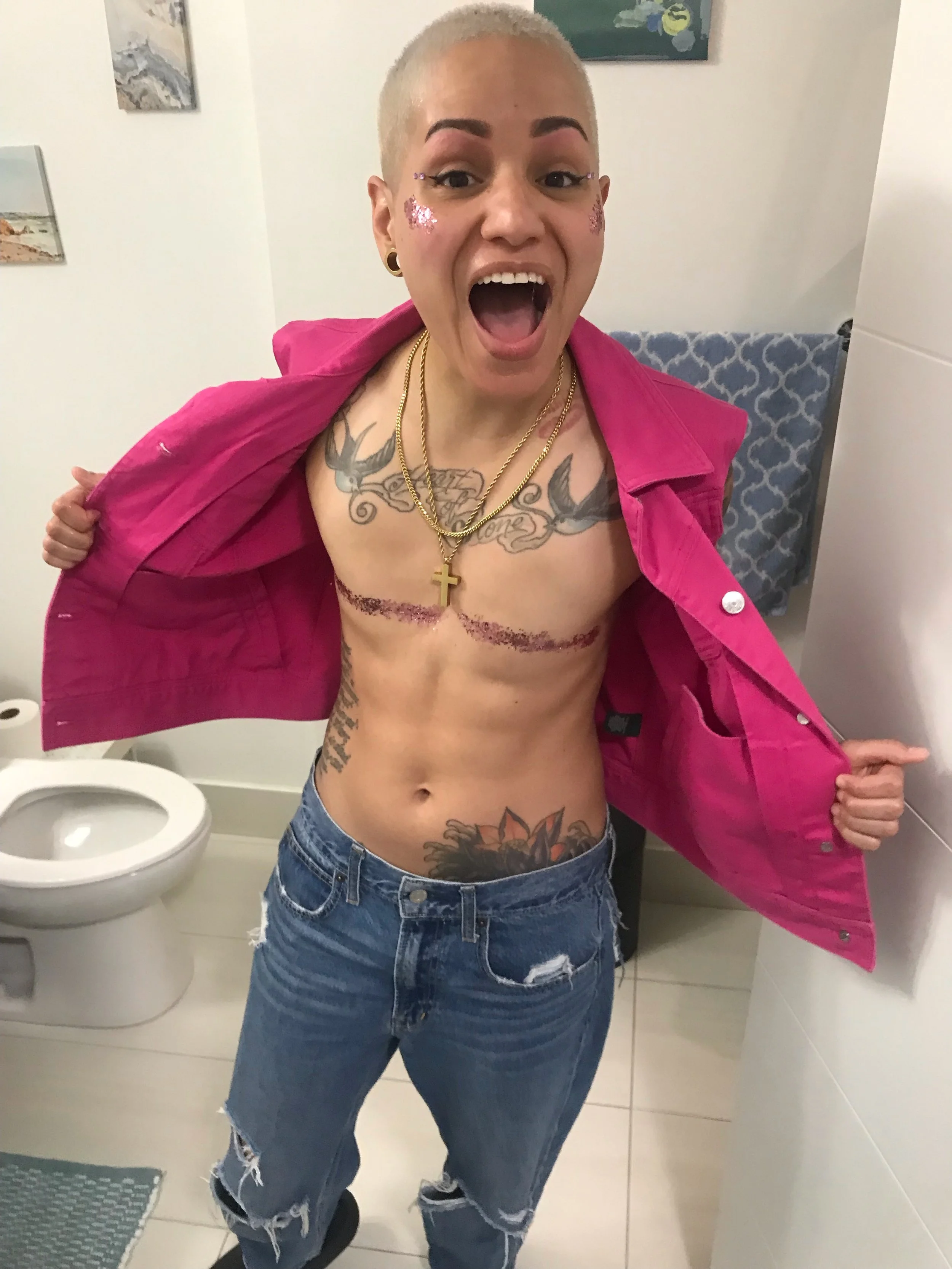 Ready for my night out with the pals at Pink Pony Club (E happy wears jeans, pink shirt and glitter on her top surgery scars)