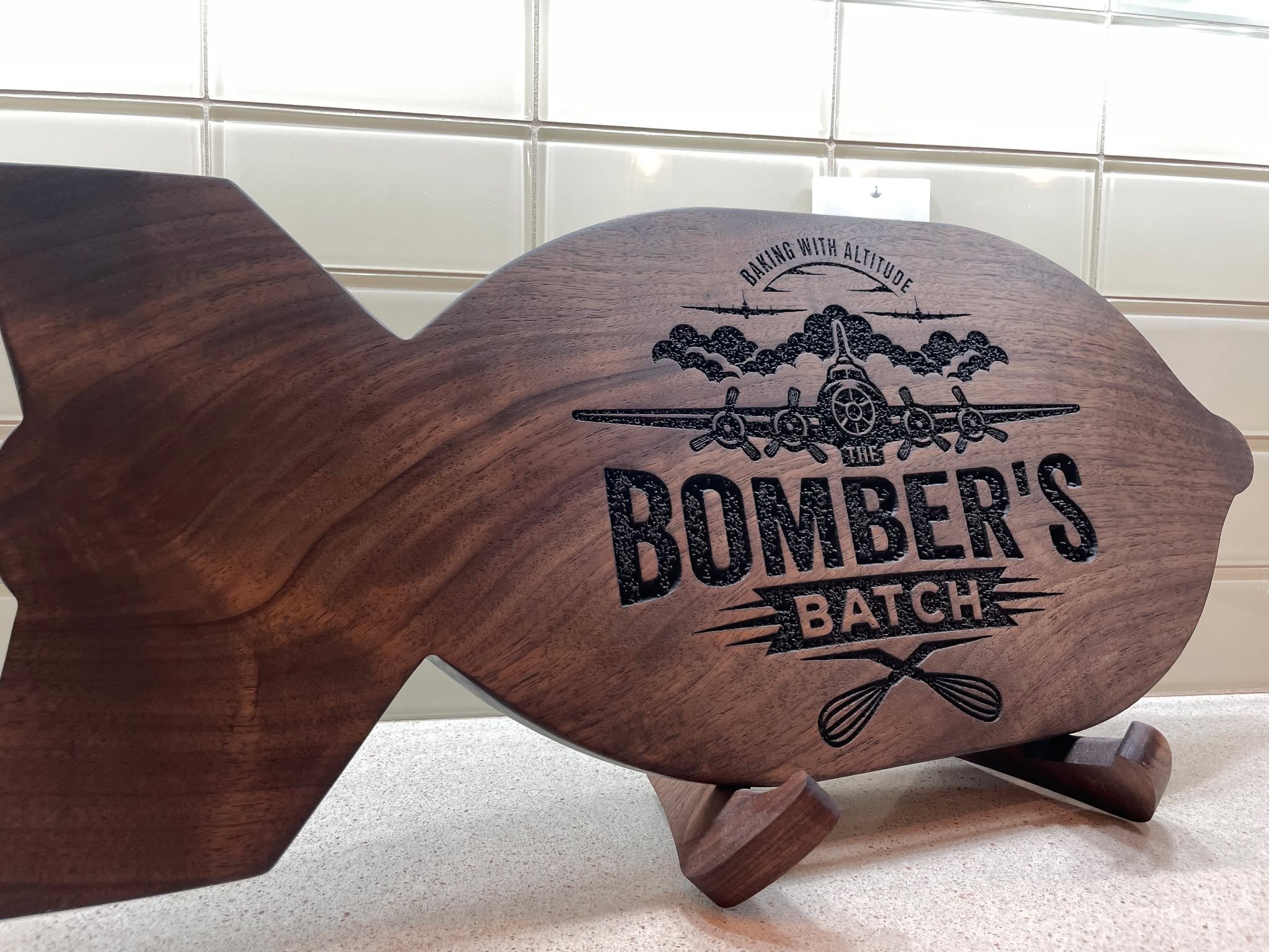 Designed to make a statement.
This custom dark walnut display for @thebombersbatch  takes inspiration from a vintage WWII 500lb bomb. Finished with @rubiomonocoatusa Oil Plus 2C Black, blending bold history with modern craftsmanship.
#FineWoodworking