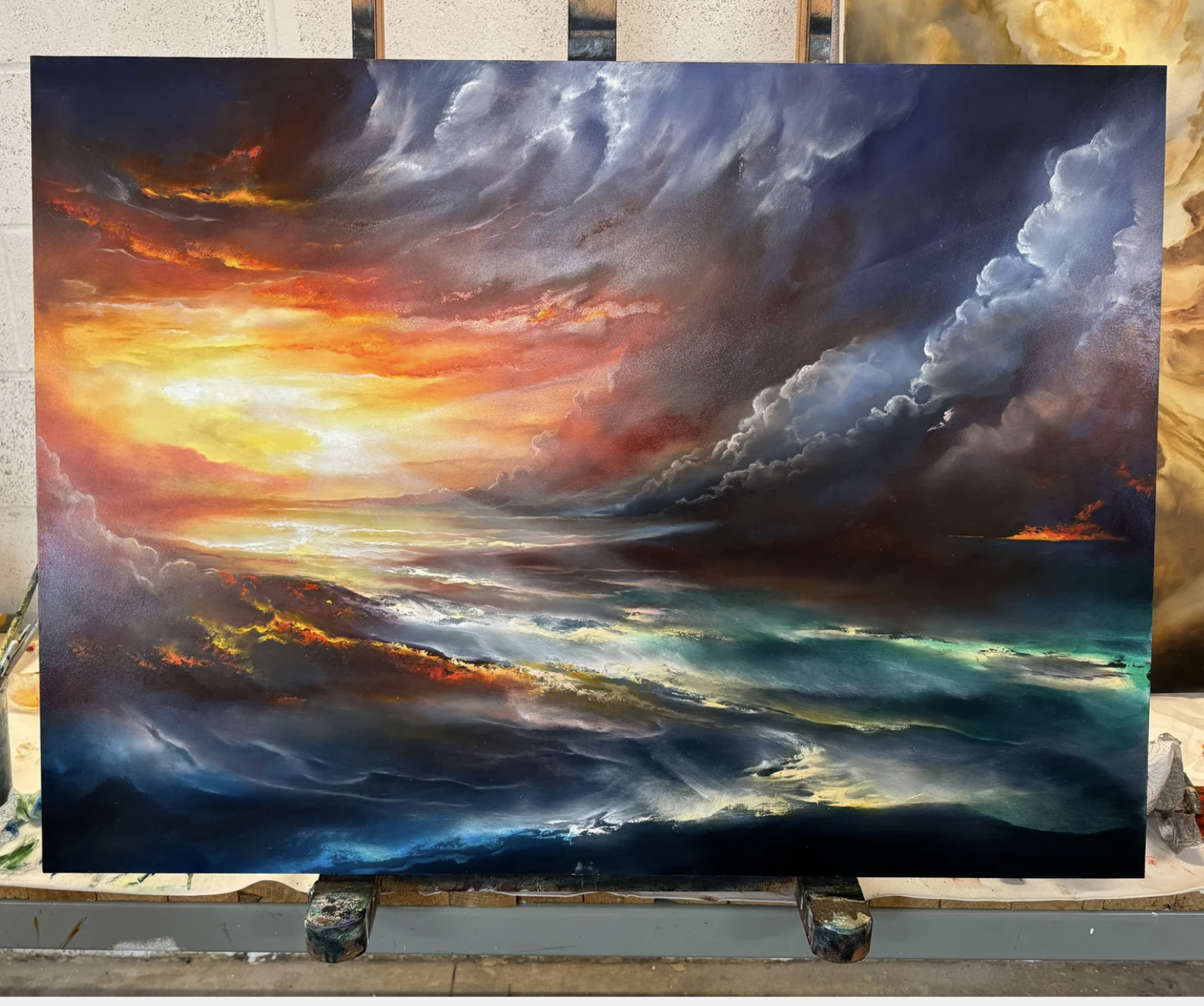 Oil painting of a dramatic seascape with a vibrant sunset sky, dark storm clouds, and turbulent ocean waves.