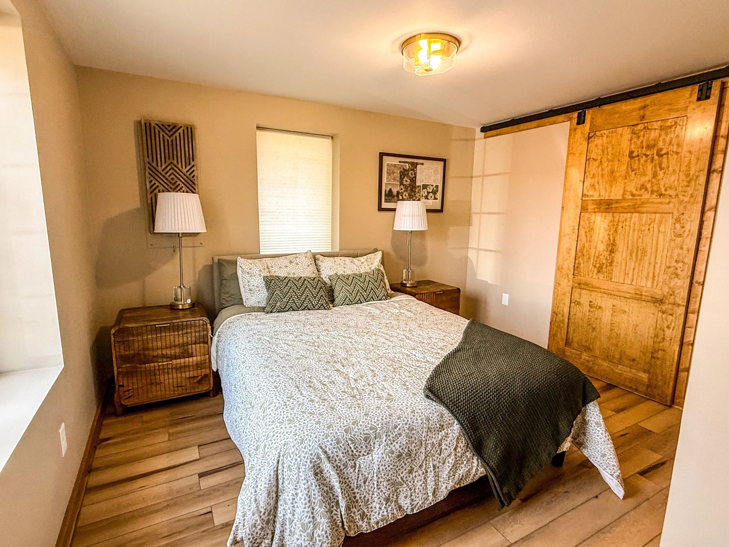 A cozy bedroom with private en-suite bathroom