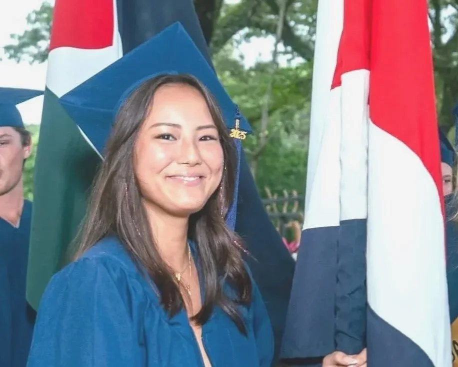 Graduate in cap and gown at IB Diploma Program ceremony Nosara Costa Rica