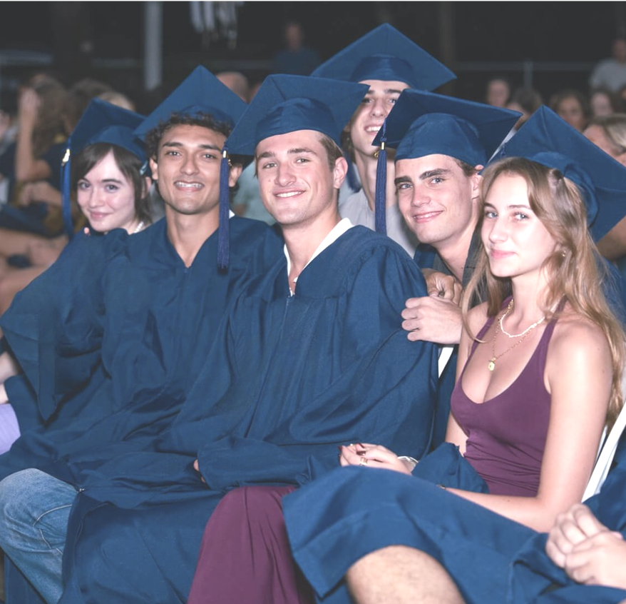 Group of five IB Diploma Programme students wearing caps and gowns during graduation ceremony in Nosara Costa Rica