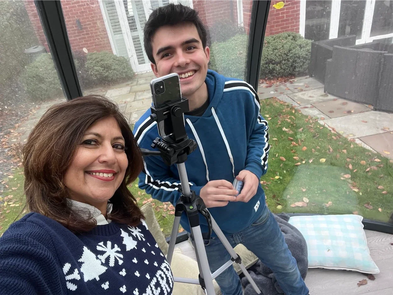 On the set of Lucky Egg Games video shoot with two crew members