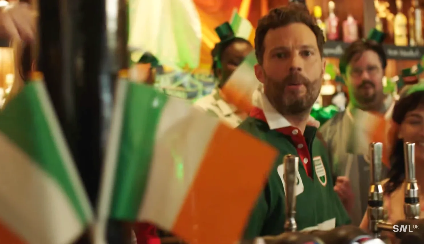 Dornan with flags.webp