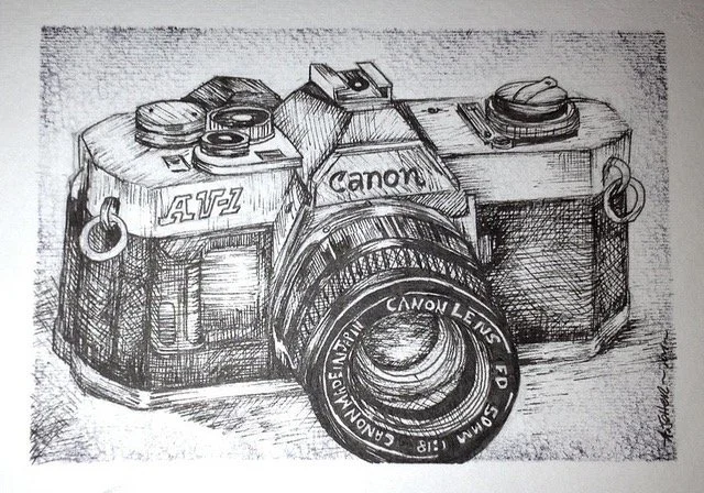 Detailed sketch of a vintage Canon AE-1 film camera with a lens labeled 'Canon LEUC 50mm 1:1.8'.
