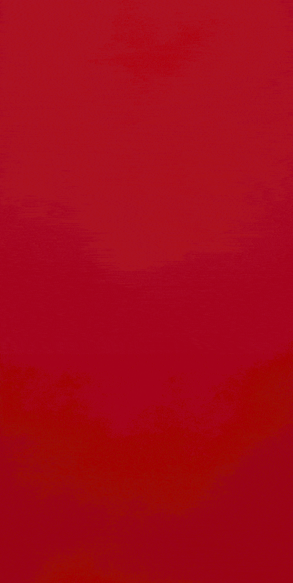 A blurred red and black abstract background.