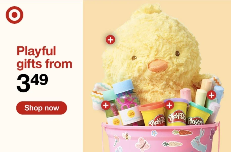 A plush yellow chick toy surrounded by Play-Doh containers and other toys in a pink basket, advertising playful gifts for $3.49.