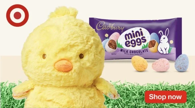 Cute yellow plush chick toy in front of Easter-themed Cadbury Mini Eggs chocolate package with pastel-colored eggs, grassy surface, and red 'Shop now' button.