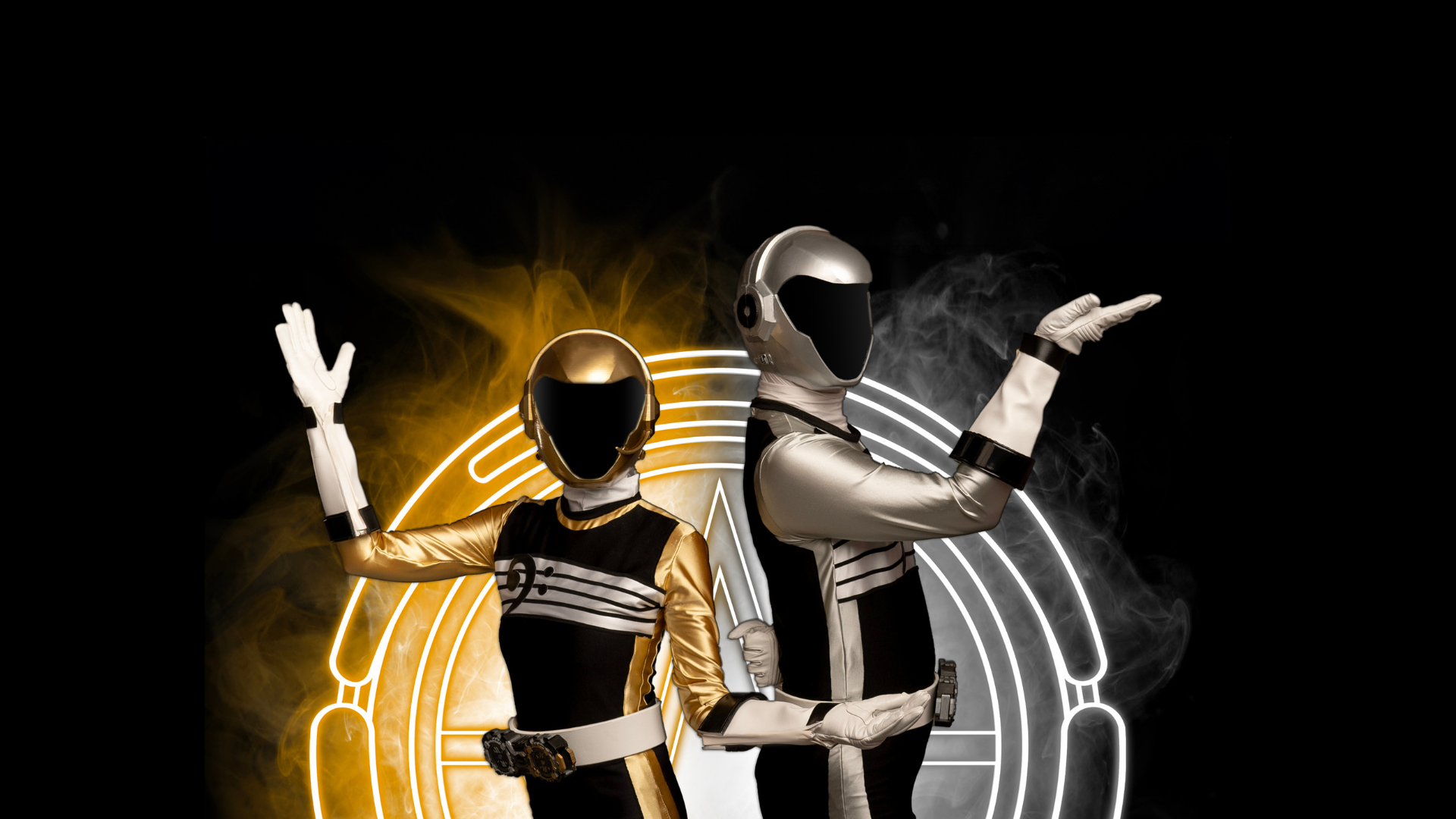 Jammin' Gold and Jammin' Silver stand in full team outfits, posing, in front of their team logo