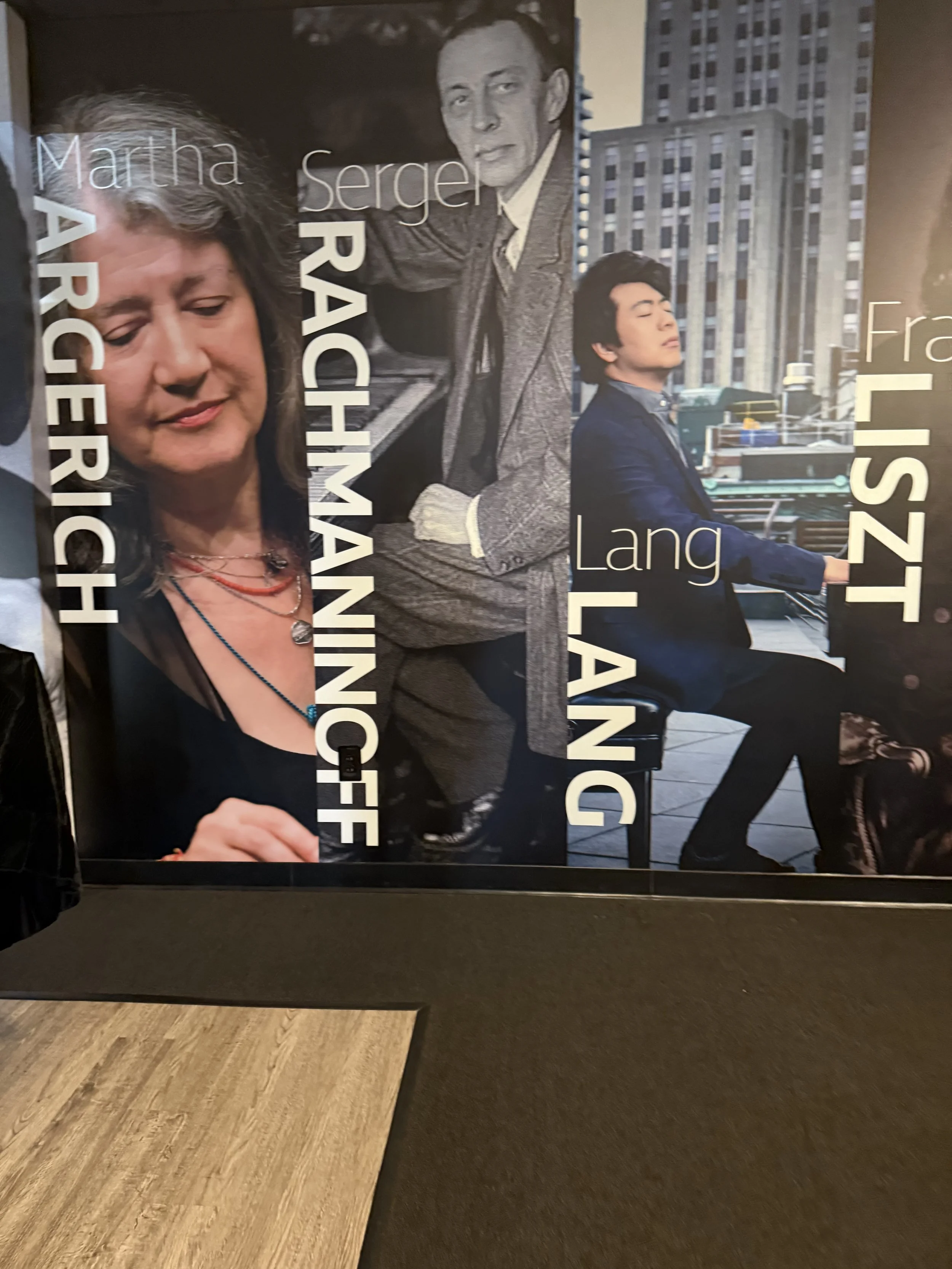 Photograph of three diverse people with names Martha Archer, Richard, and Lisa, seated in front of a cityscape background with tall buildings.