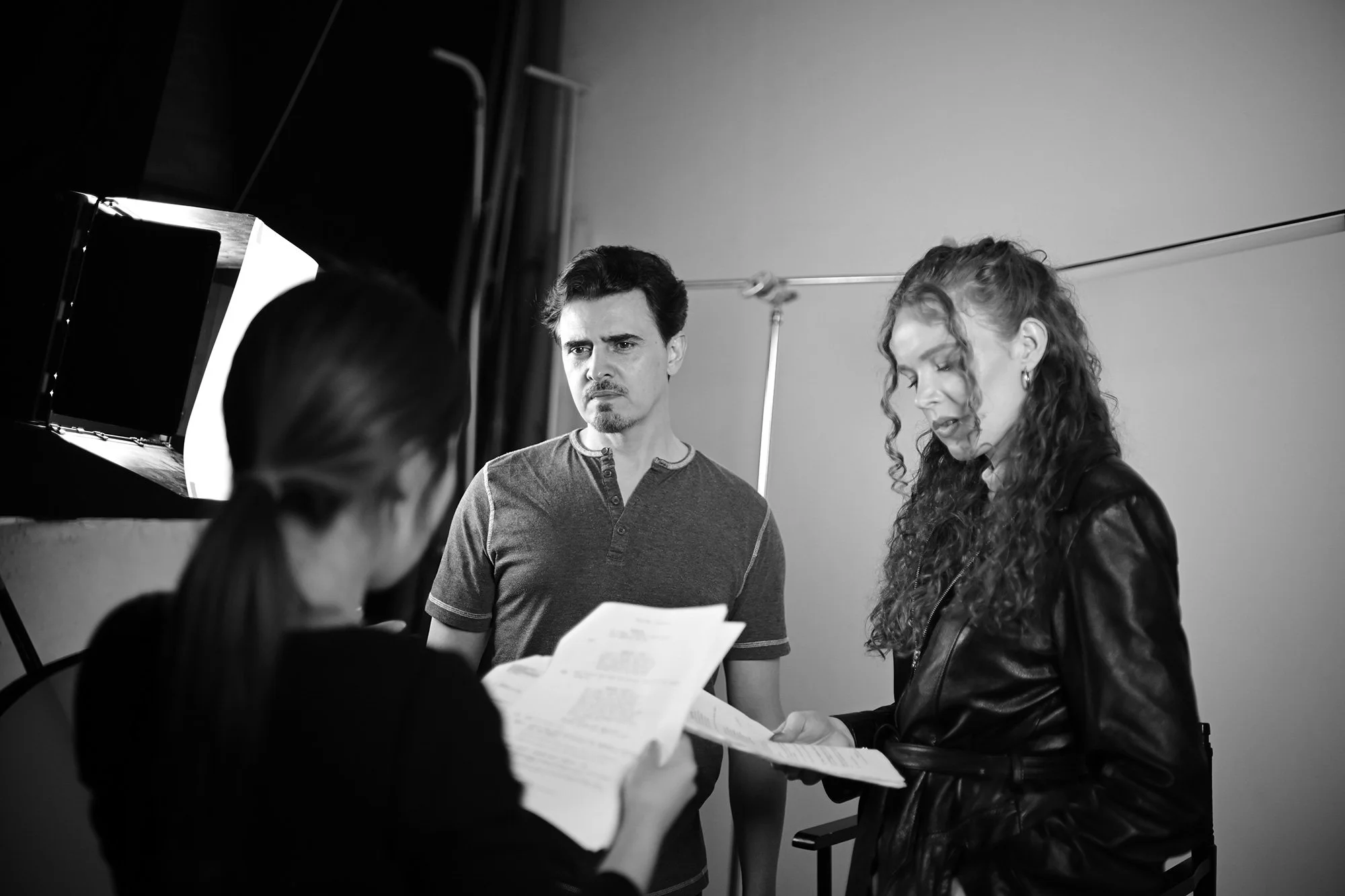 Actor Jason Arcaro and Mary Healy being directed by Sophia Lim on the set of Blood Pressure.