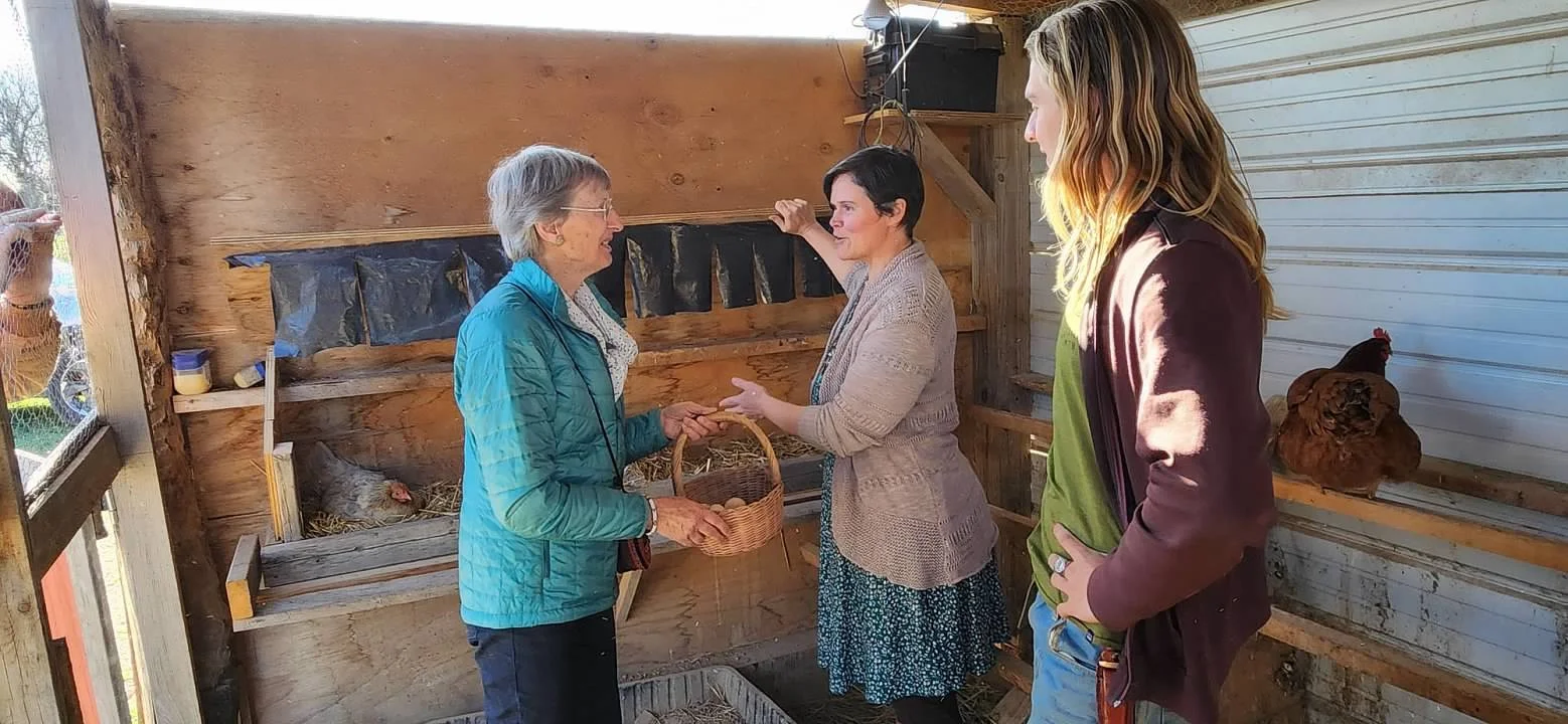 c and chantal picking eggs.jpg